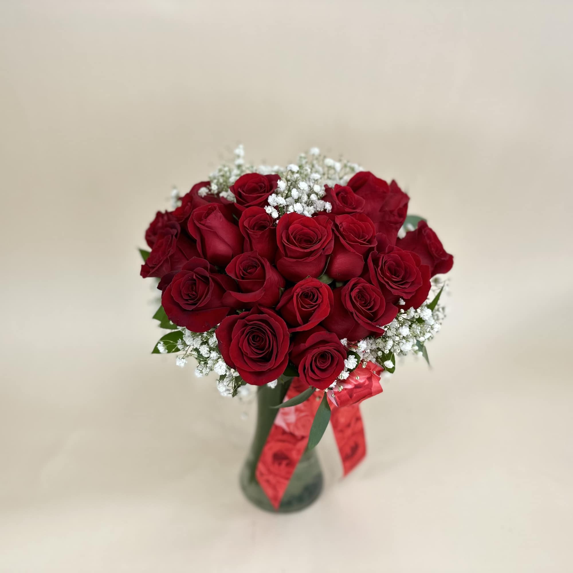Red roses arranged in the shape of a heart - a clear