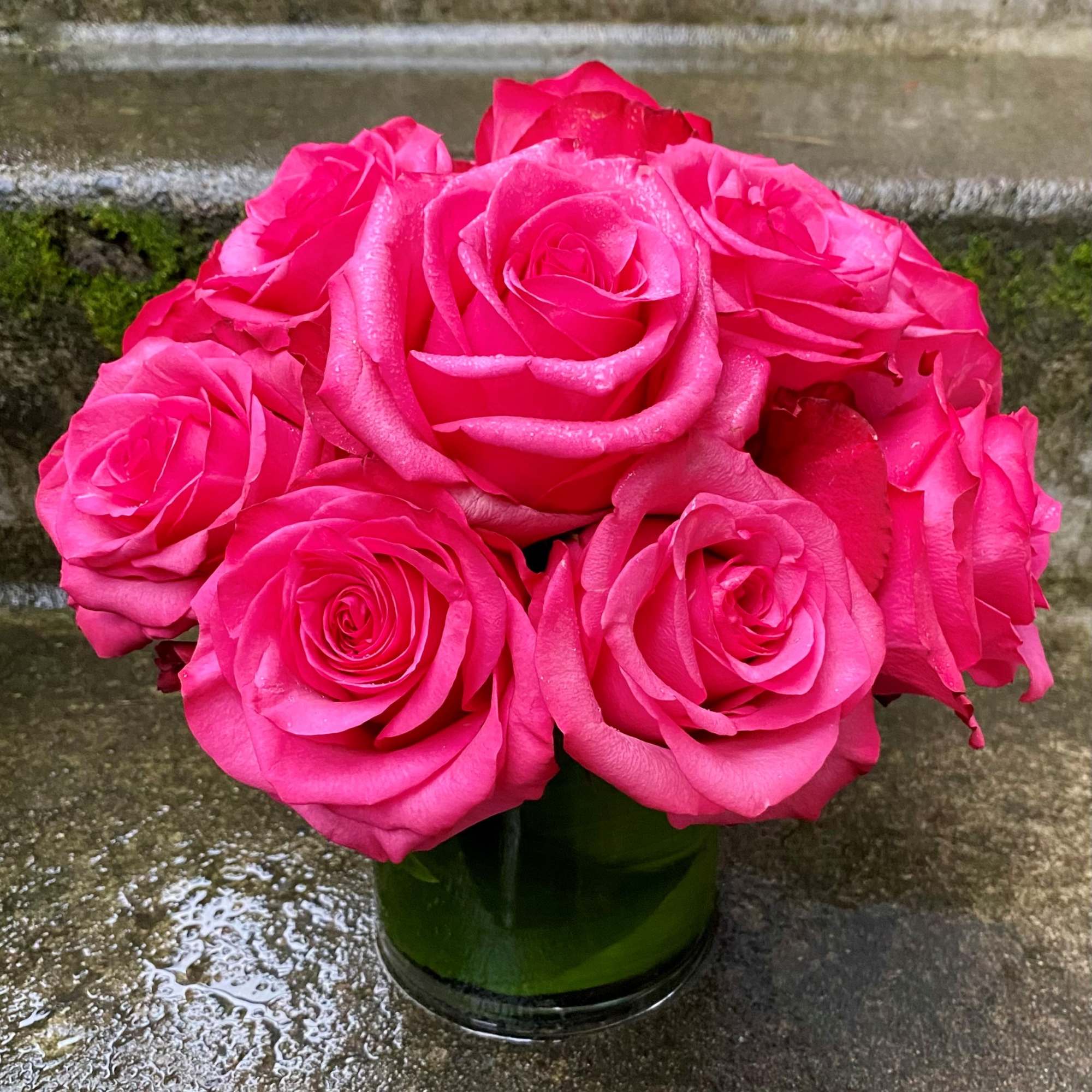 Classic, simple, perfect. One dozen premium roses arranged without filler or fuss