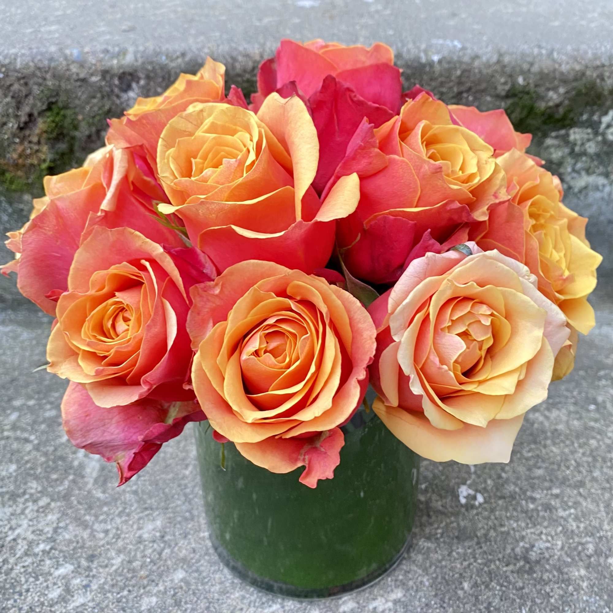 Classic, simple, perfect. One dozen premium roses arranged without filler or fuss