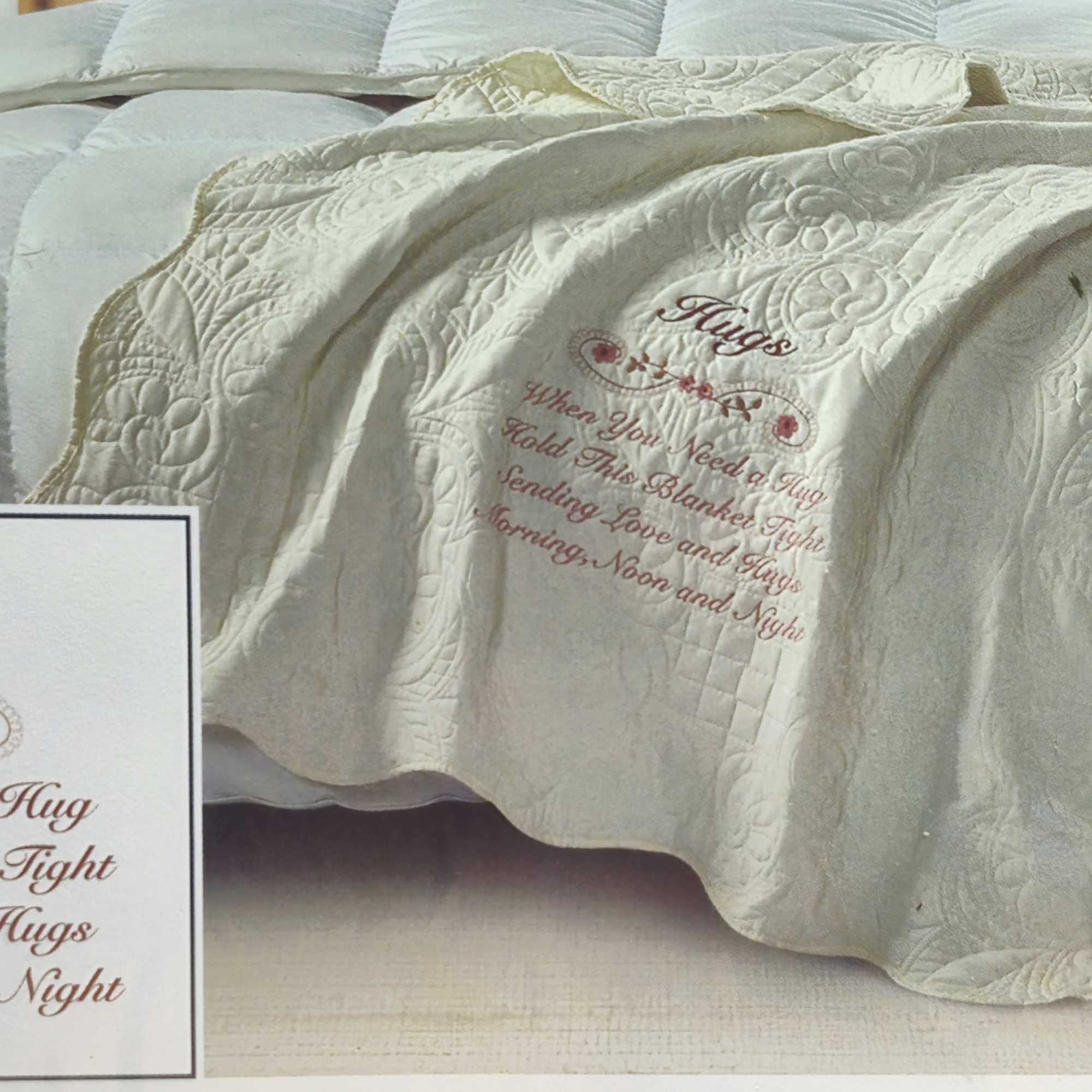 Soft cream quilting and warm embroidered script make this gift feel like