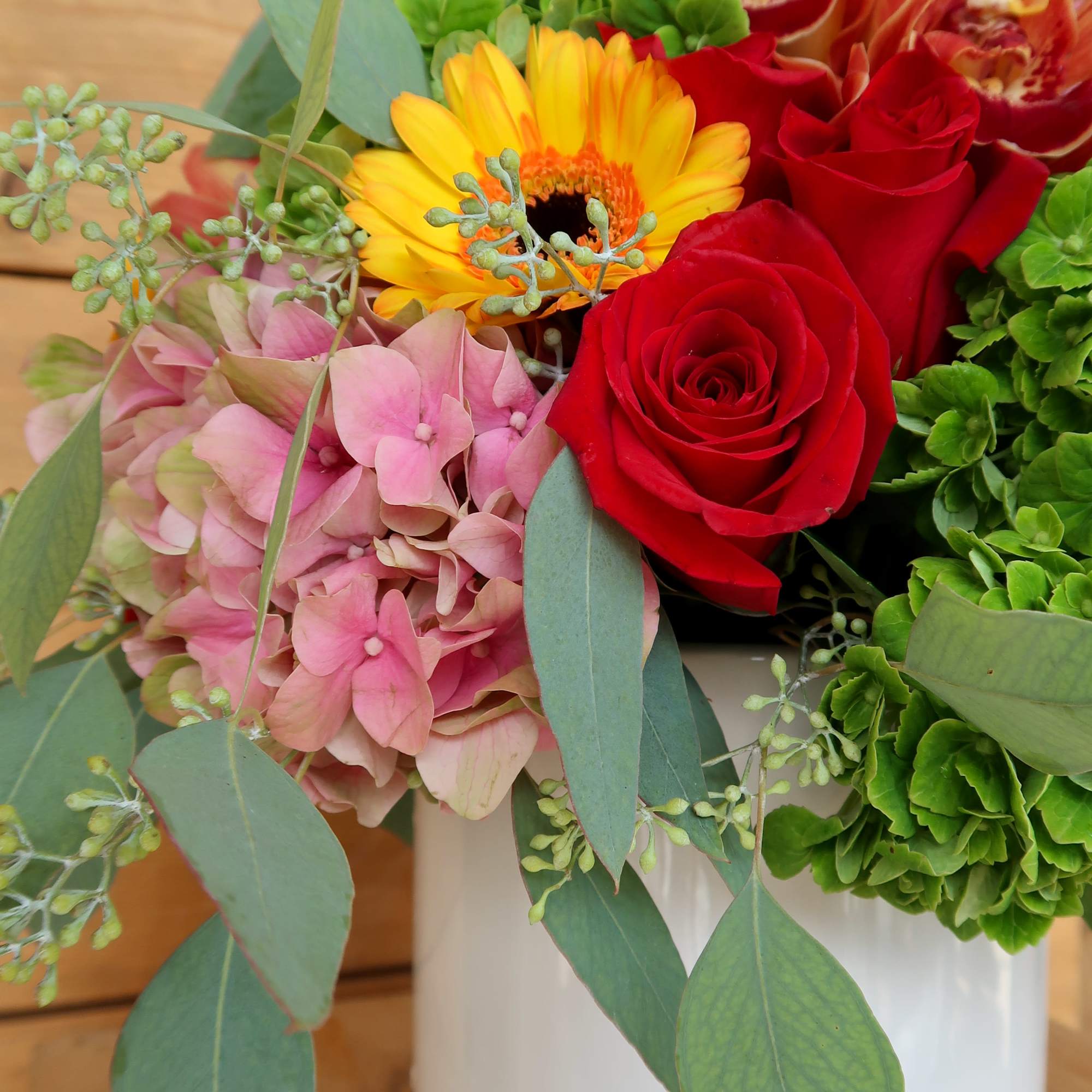 A beautiful vibrant bouquet filled with the seasons blooms. Perfect for any