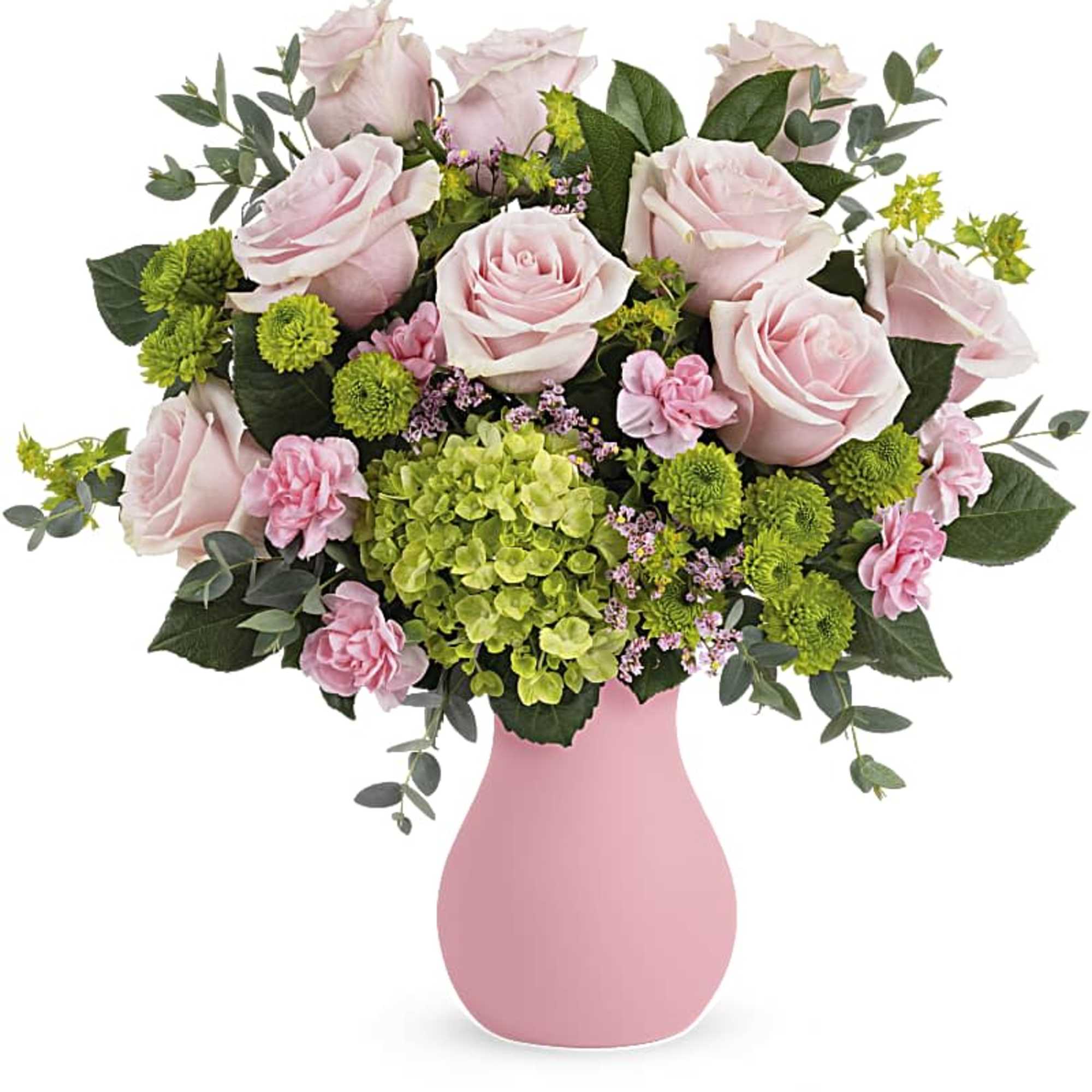 Pink roses and green hydrangea with small pink blooms in a matte pink vase