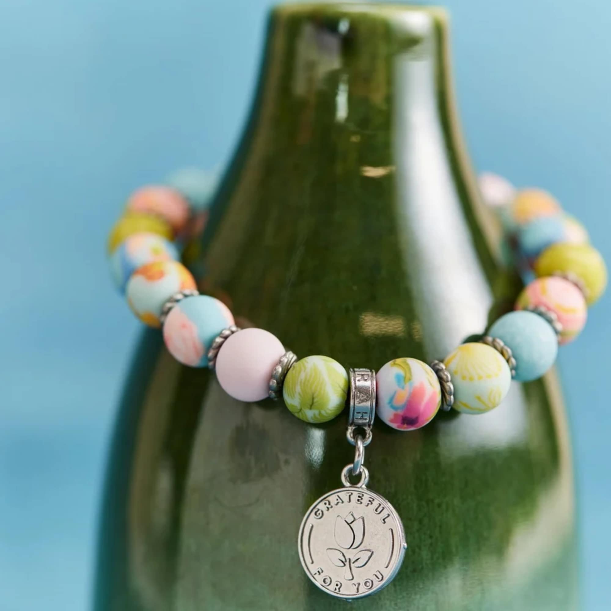 These clay bracelets are handmade, each bead its own work of art!