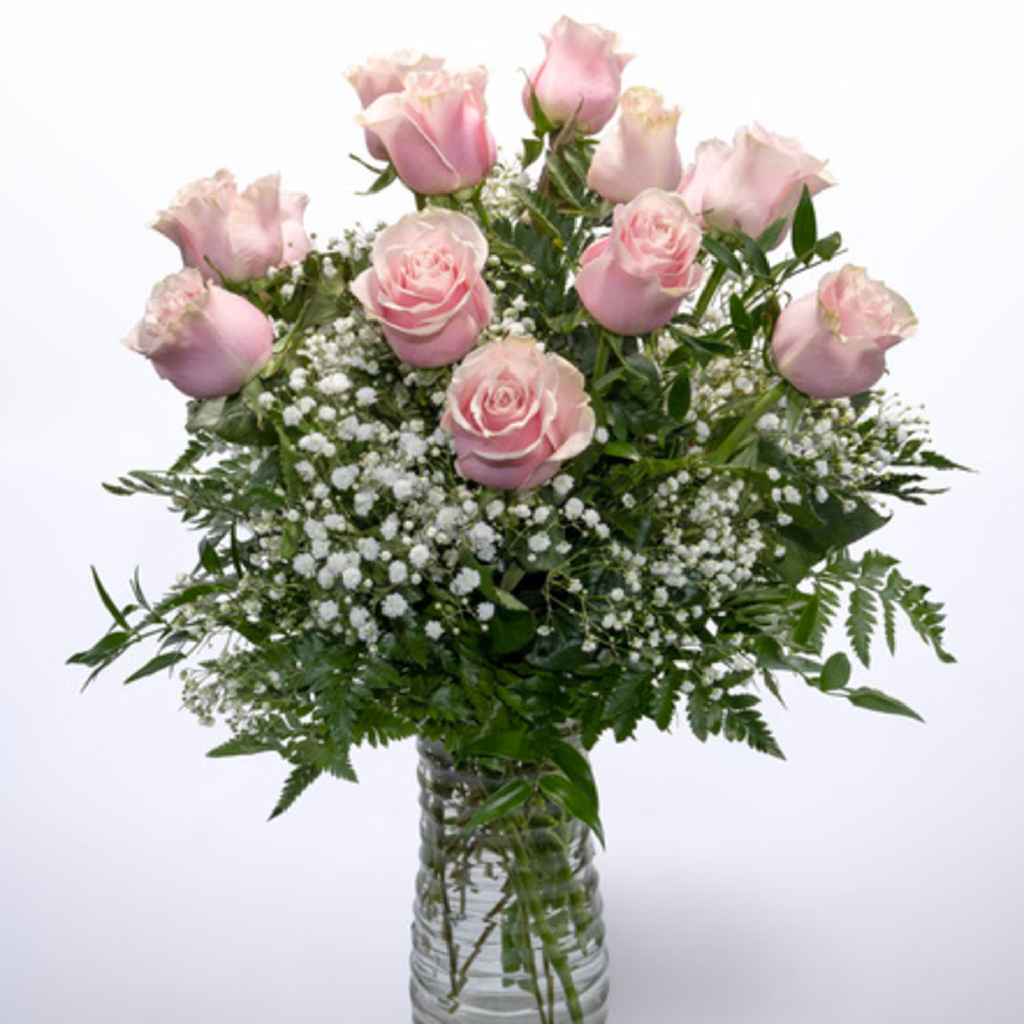 A timeless expression of grace and admiration, this arrangement features soft light