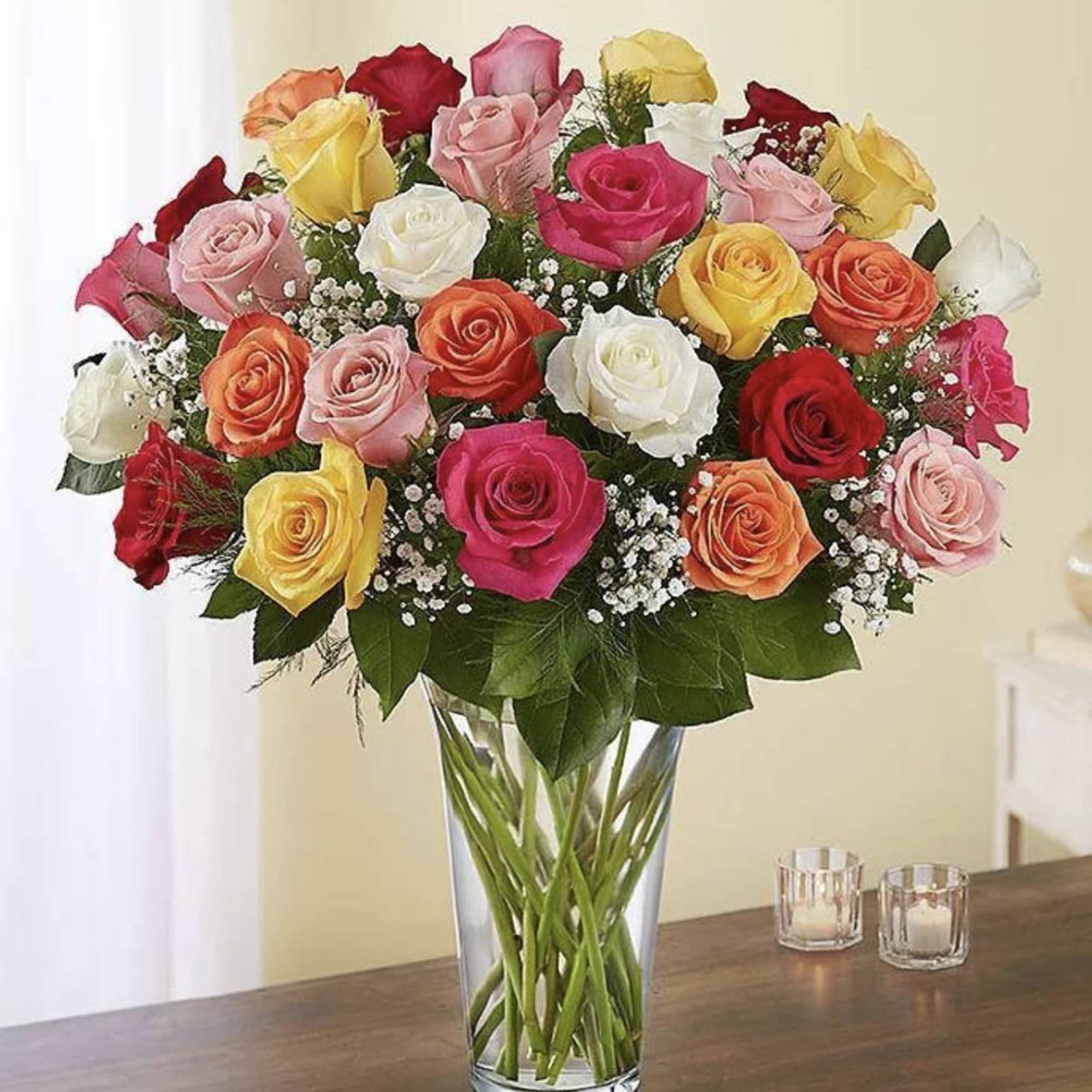 12 roses Send an explosion of color with this long-stemmed rose arrangement