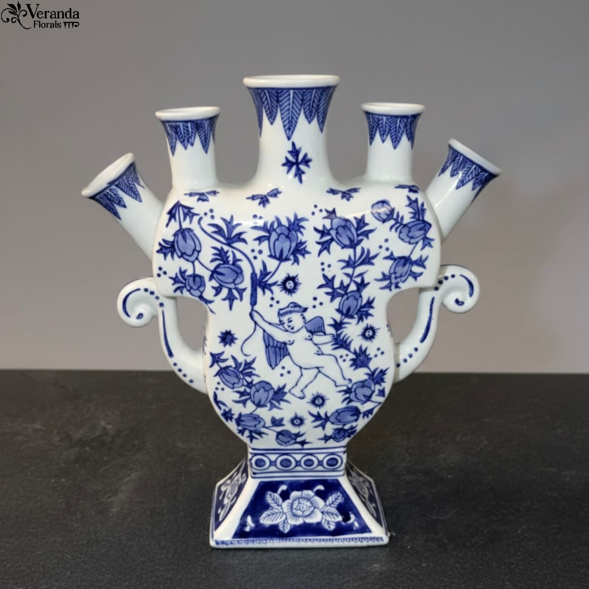 Elevate your floral design with this elegant Blue and White Tulipiere. Inspired