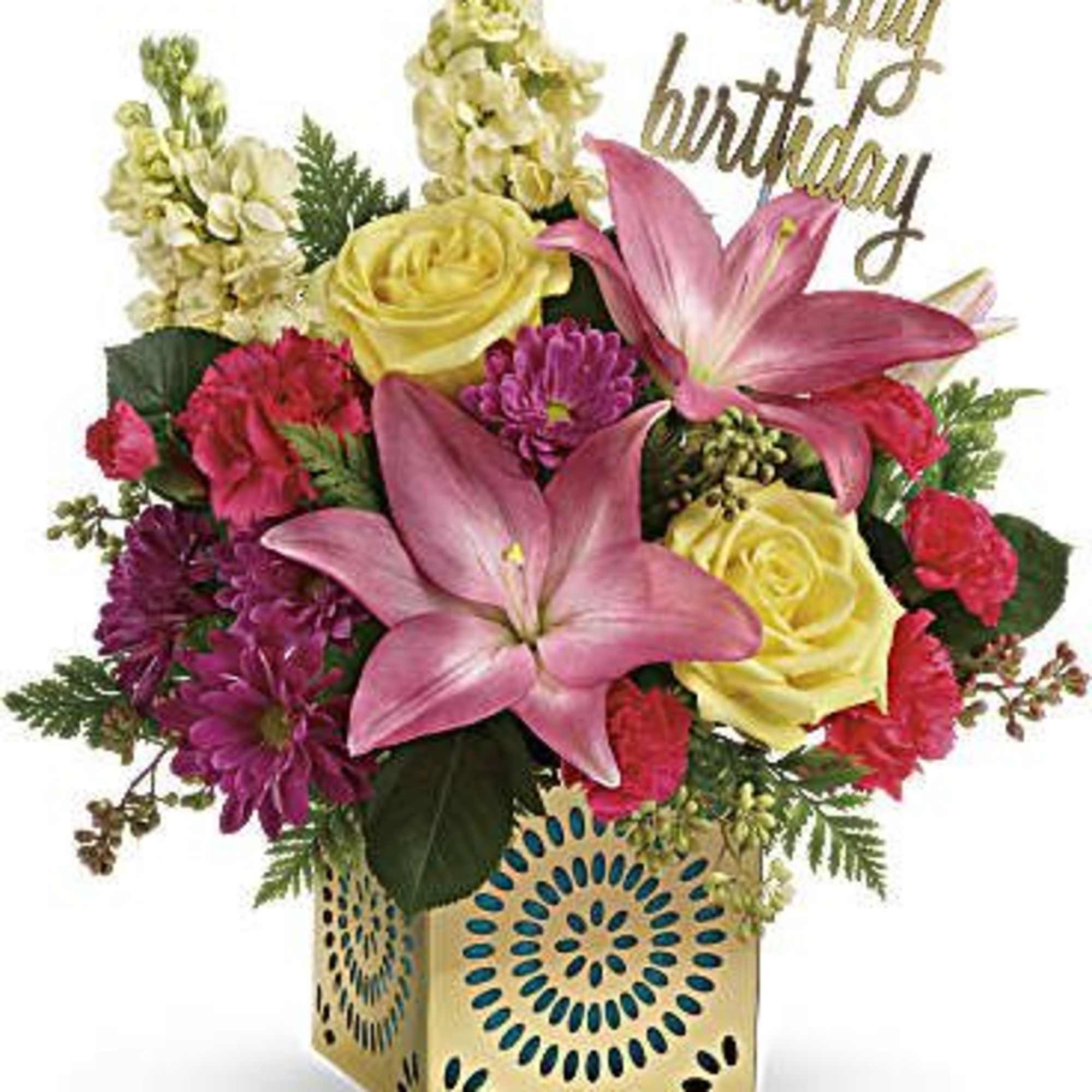 Birthday arrangement with pink lilies, yellow roses and mixed blooms in a gold cube container