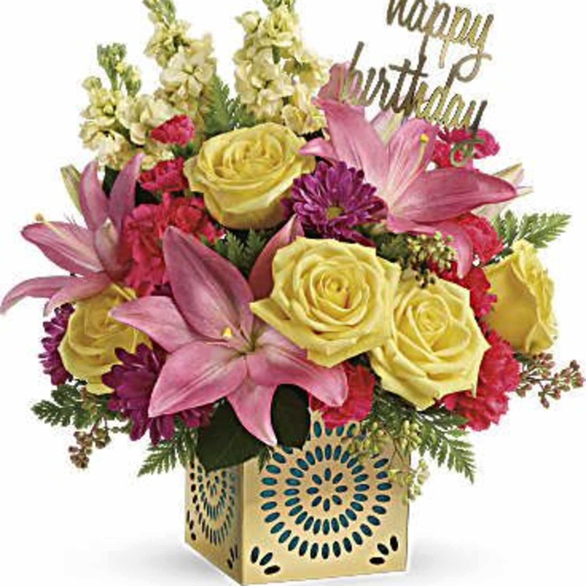 Bright arrangement of yellow roses, pink lilies, and mixed blooms in a gold cube with a happy birthday sign.