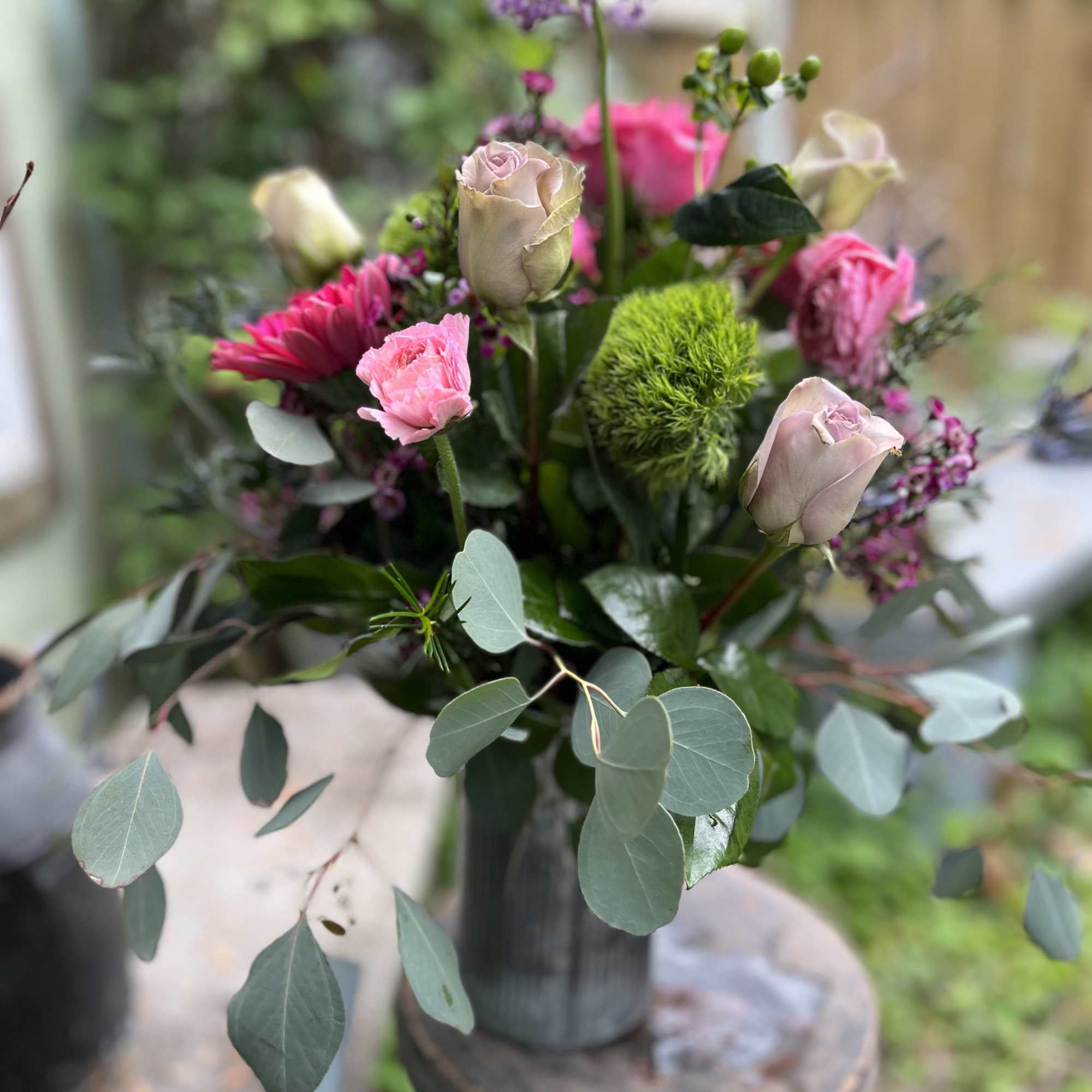 This arrangement is filled with an amazing collection of eye catching flowers