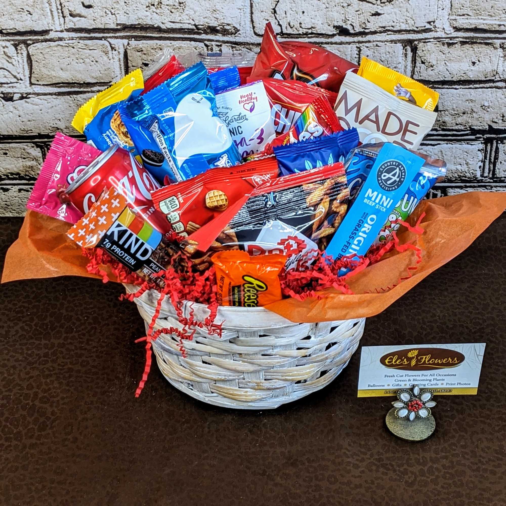 This fun and vibrant snack basket is packed with a delicious assortment