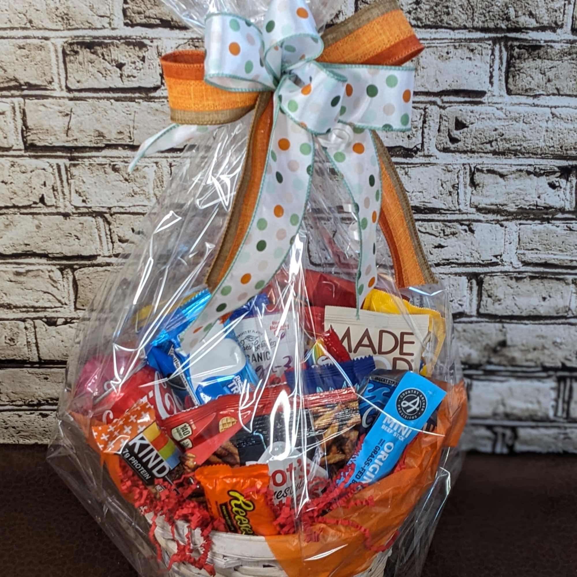 This fun and vibrant snack basket is packed with a delicious assortment