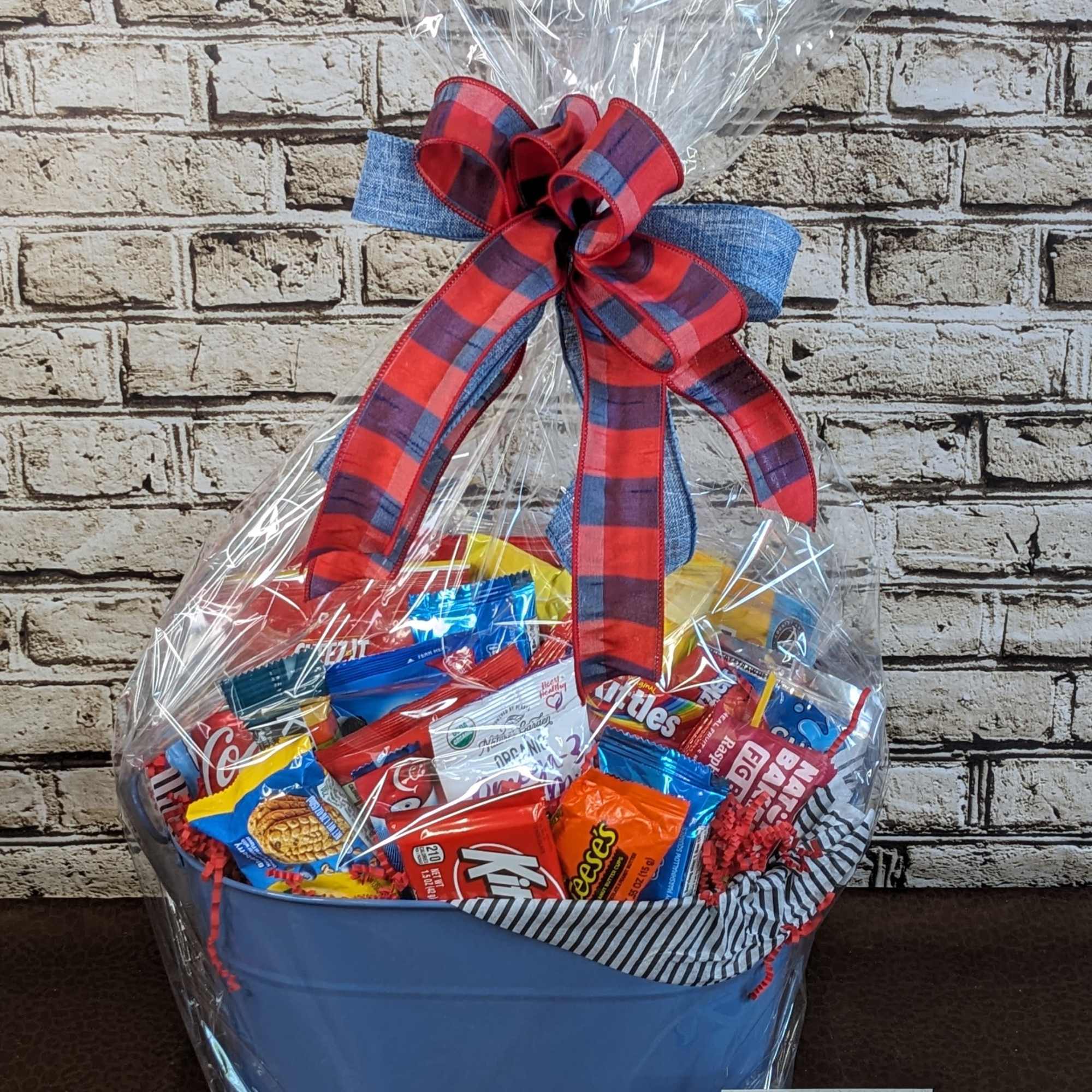 This fun and vibrant snack basket is packed with a delicious assortment