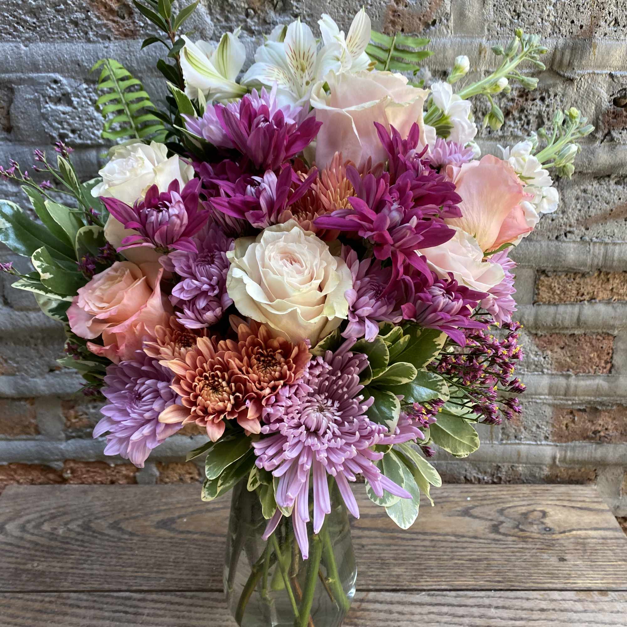 Mixed pink and white bouquet in a glass vase