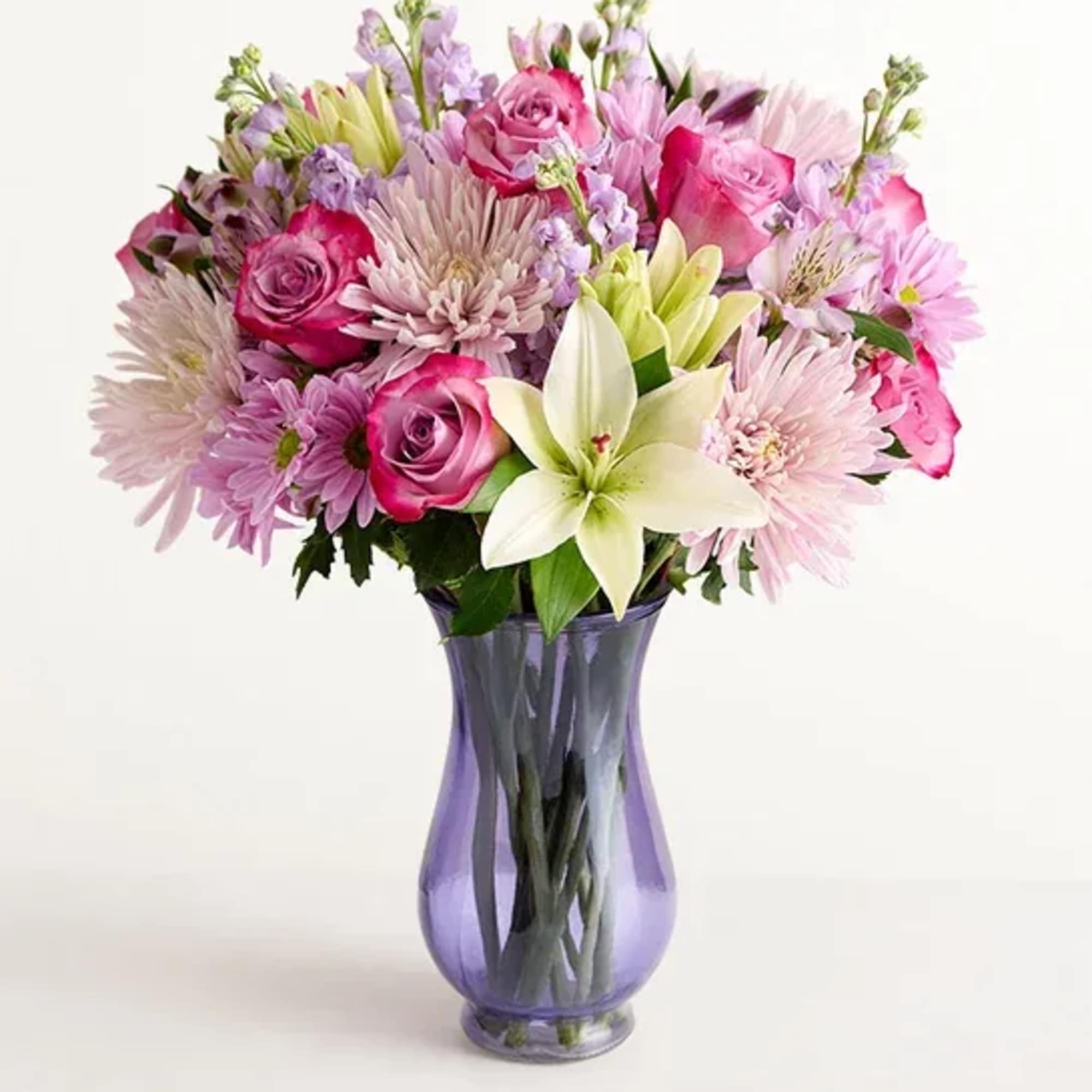  bouquet of purple roses; lavender stock, Peruvian lilies (alstroemerias), and daisies;