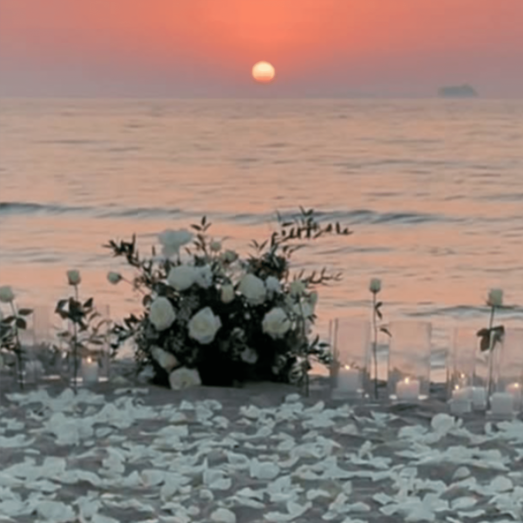 A breathtaking oceanfront floral design that captures the magic of golden hour.