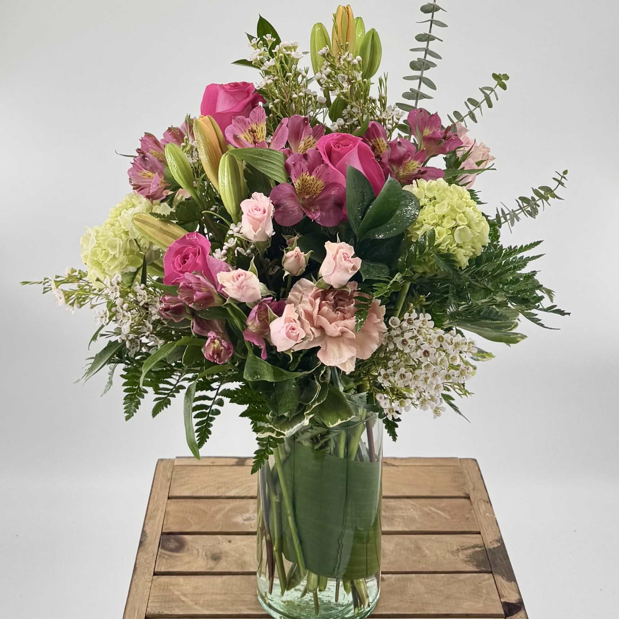 Introducing "Blush Life," a delightful flower arrangement that combines vibrant shades of