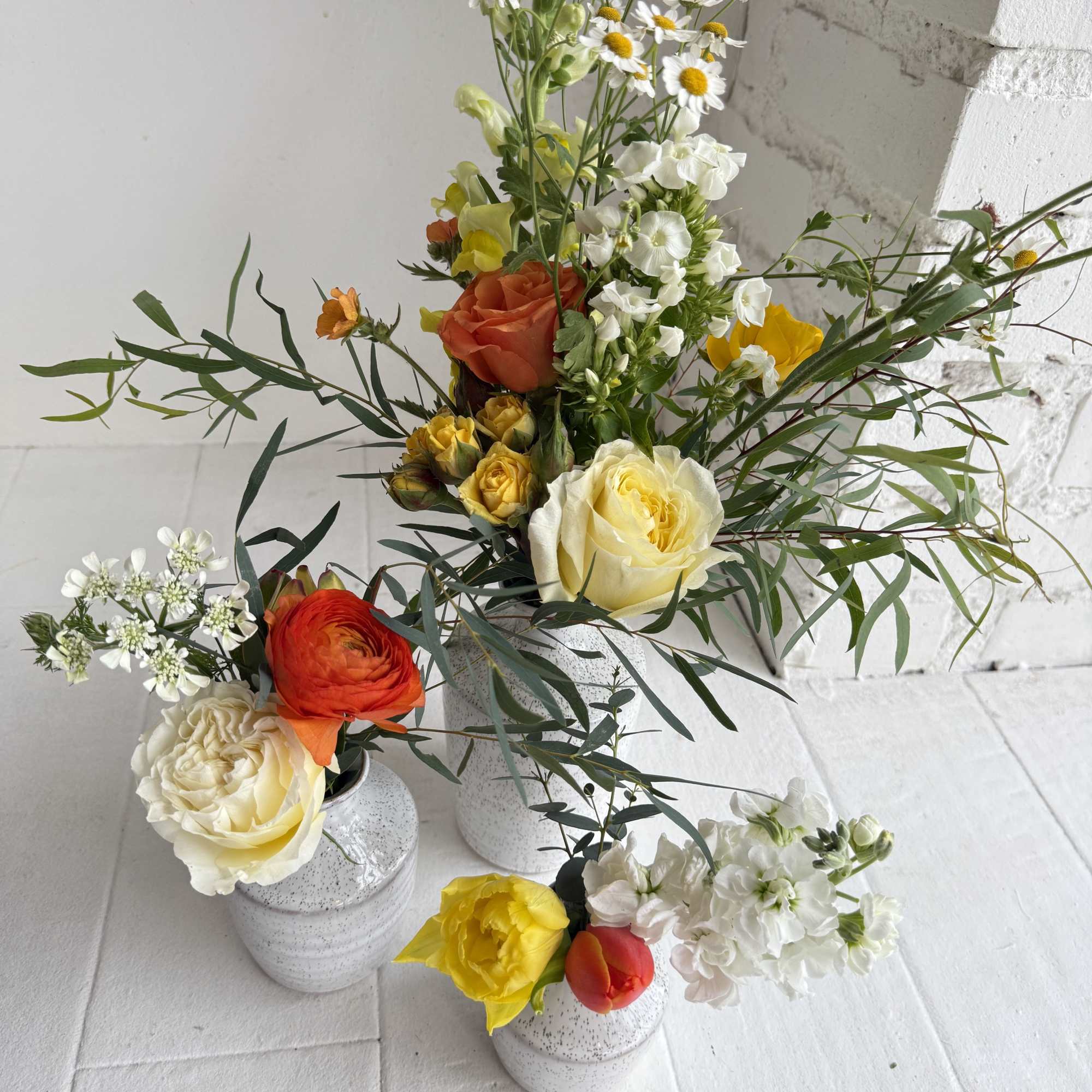 Beautiful blooms in shades of orange, yellow and white in a set