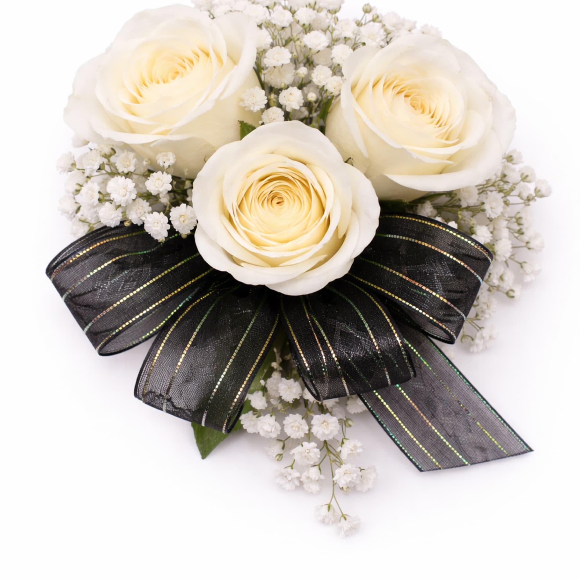 Corsage with three ivory roses, tiny white filler flowers, and a black striped bow.