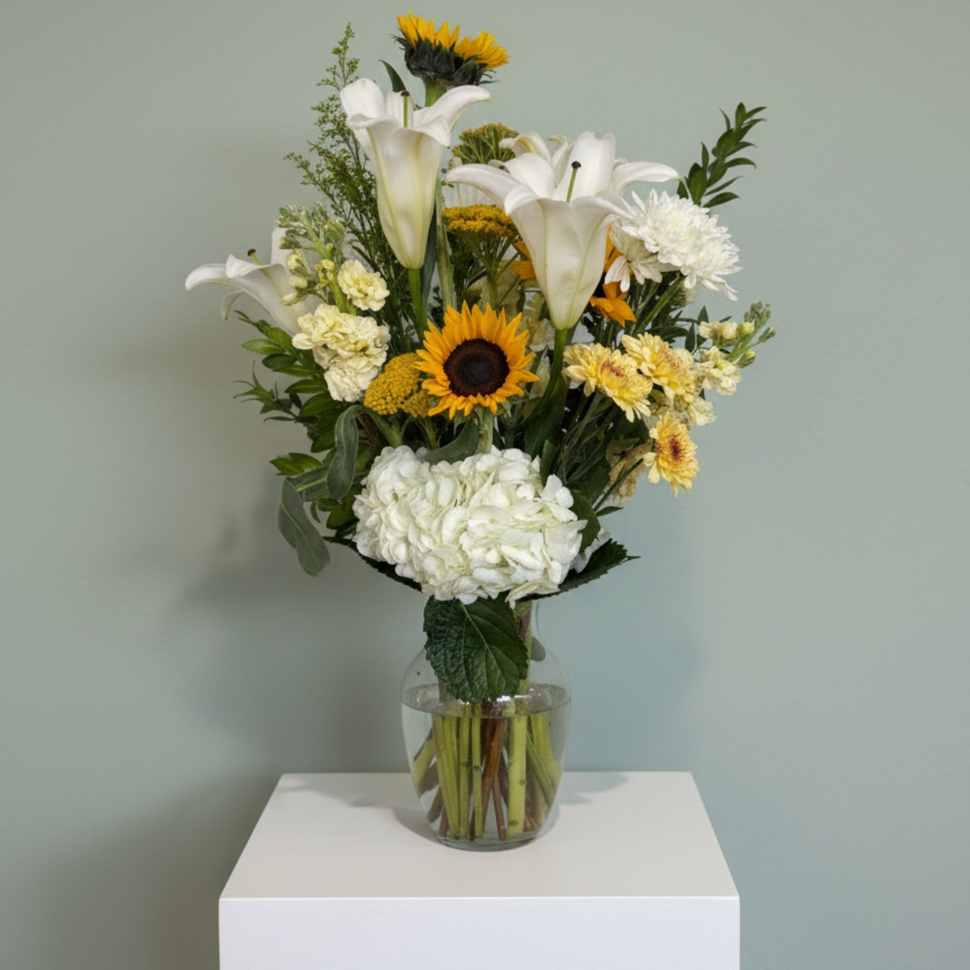 Send the gift of friendship and beautiful blooms with this delicate and