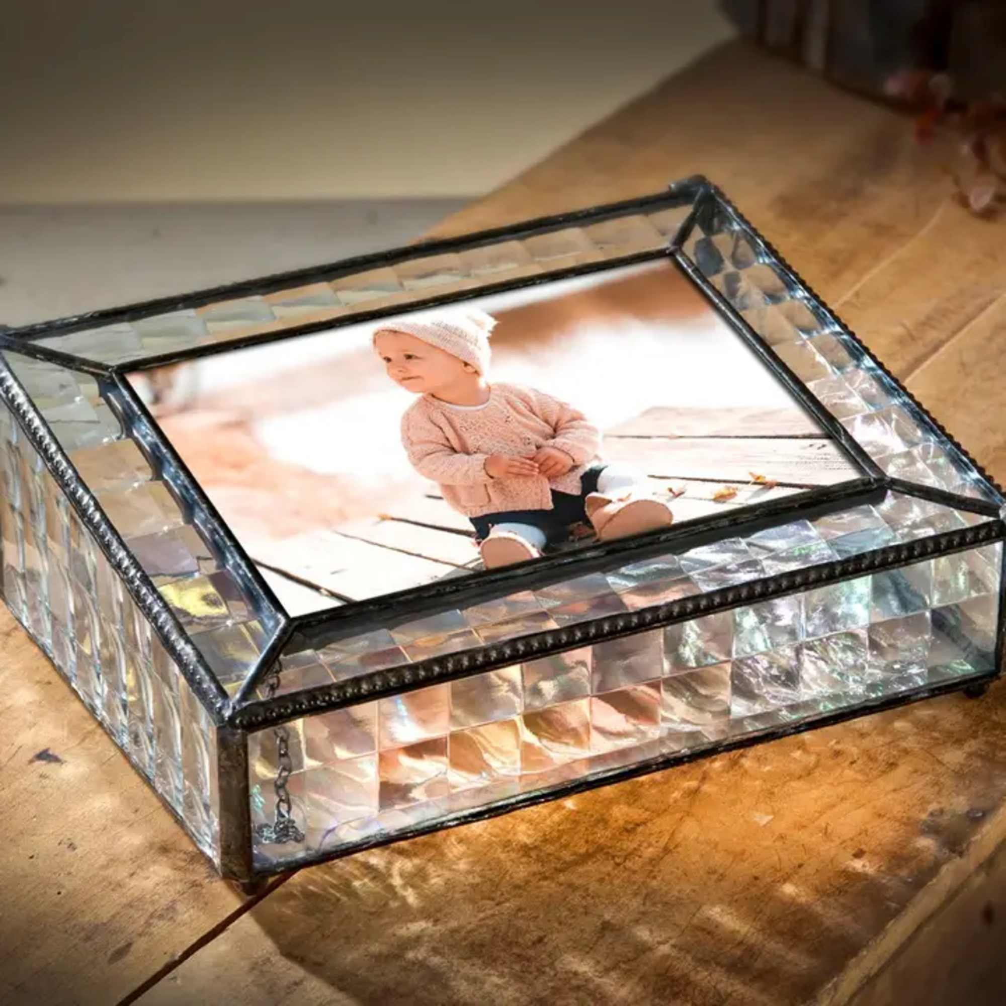 Decorative glass keepsake box with a baby photo on the lid