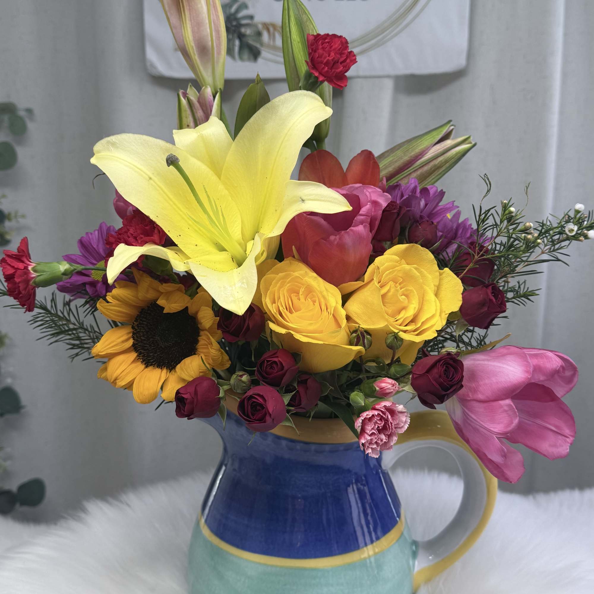 A vibrant and cheerful arrangement designed to brighten any space. This stunning