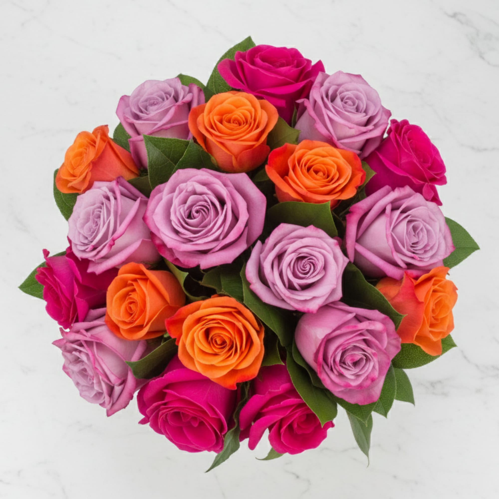 Top-down view of a round bouquet of lavender, hot pink, and orange roses.