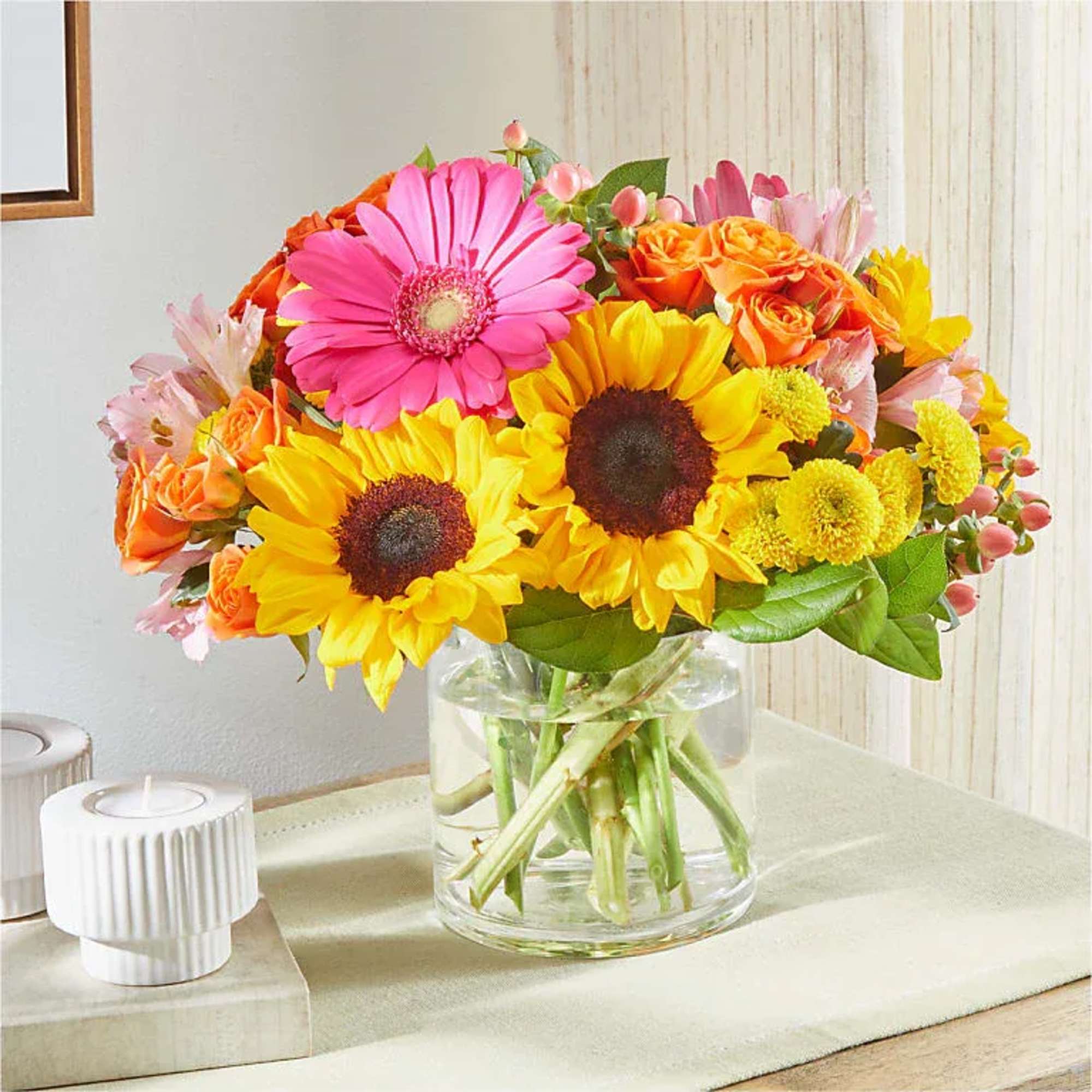 As colorful as a wagon full of beach toys, this energetic arrangement
captures