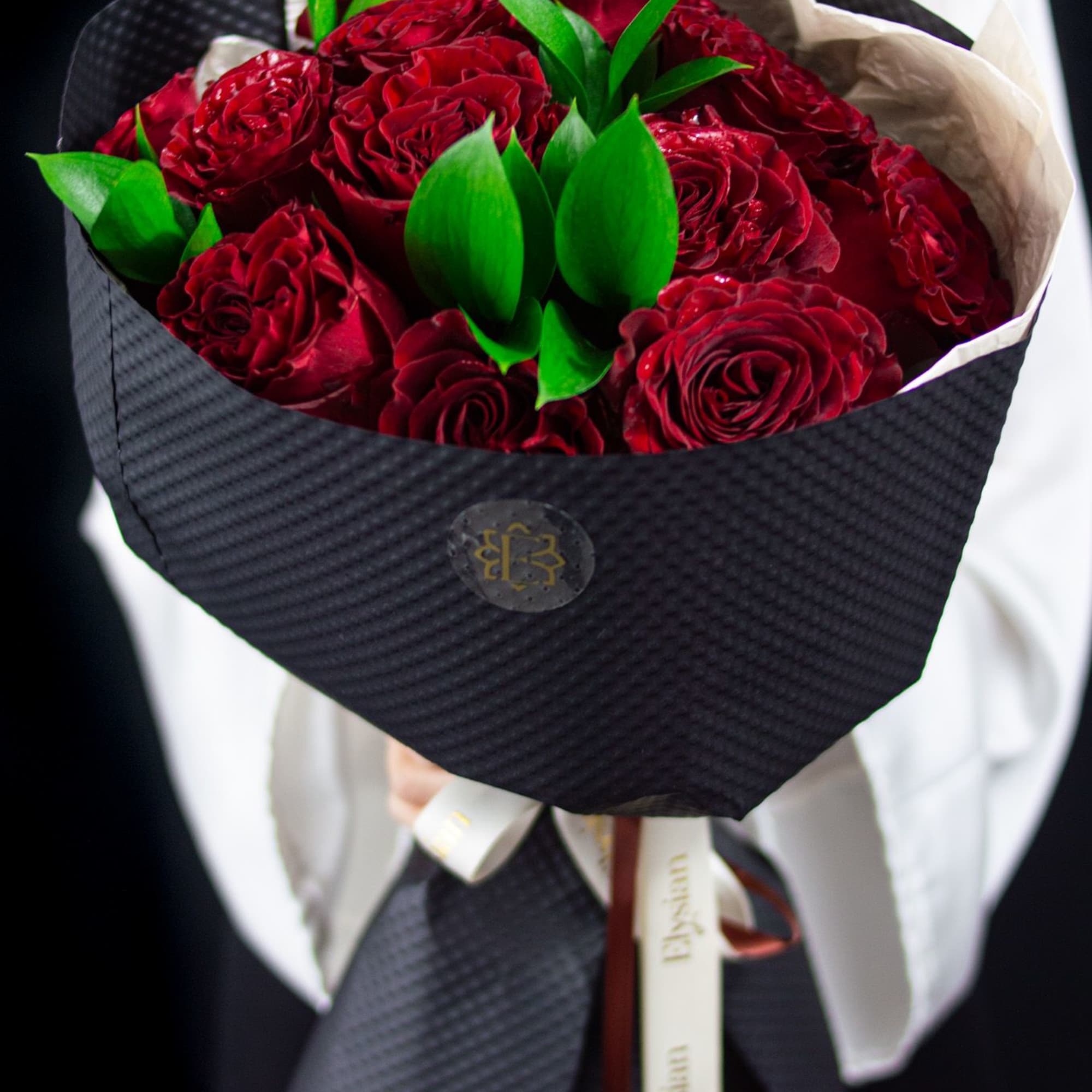 Classic, powerful, and undeniably romantic. Midnight Heart is a striking bouquet of