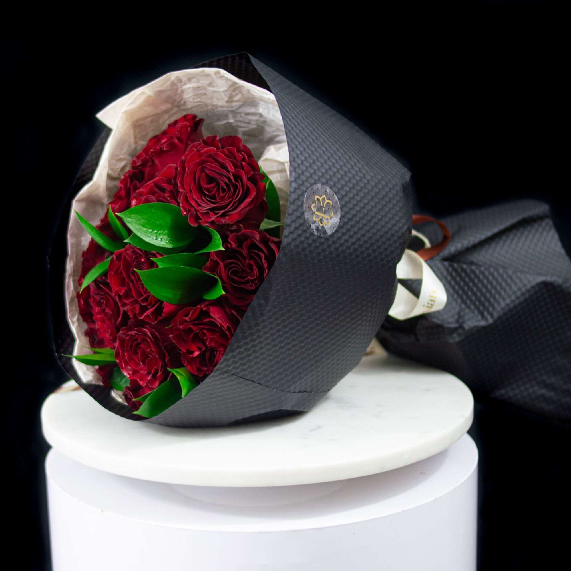 Classic, powerful, and undeniably romantic. Midnight Heart is a striking bouquet of