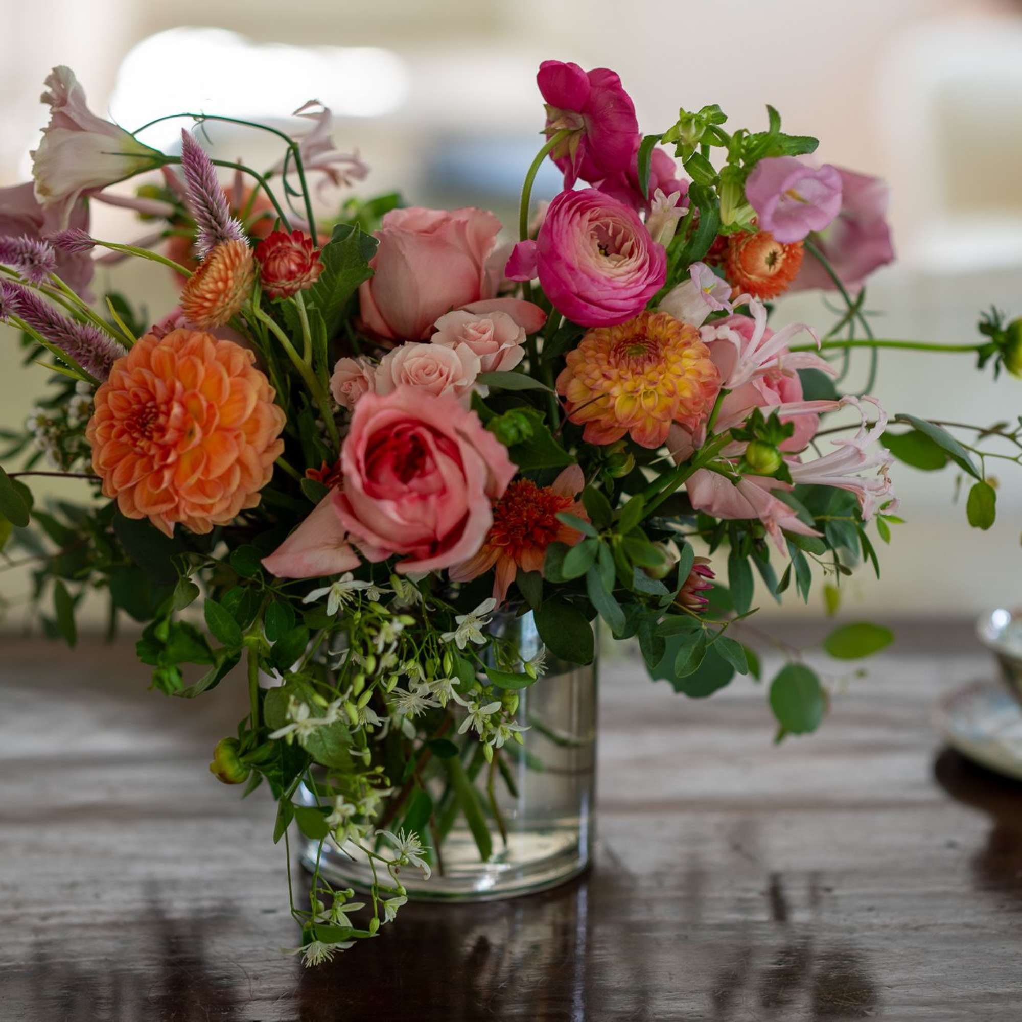 Beautiful and vibrant seasonal florals in a garden design.   