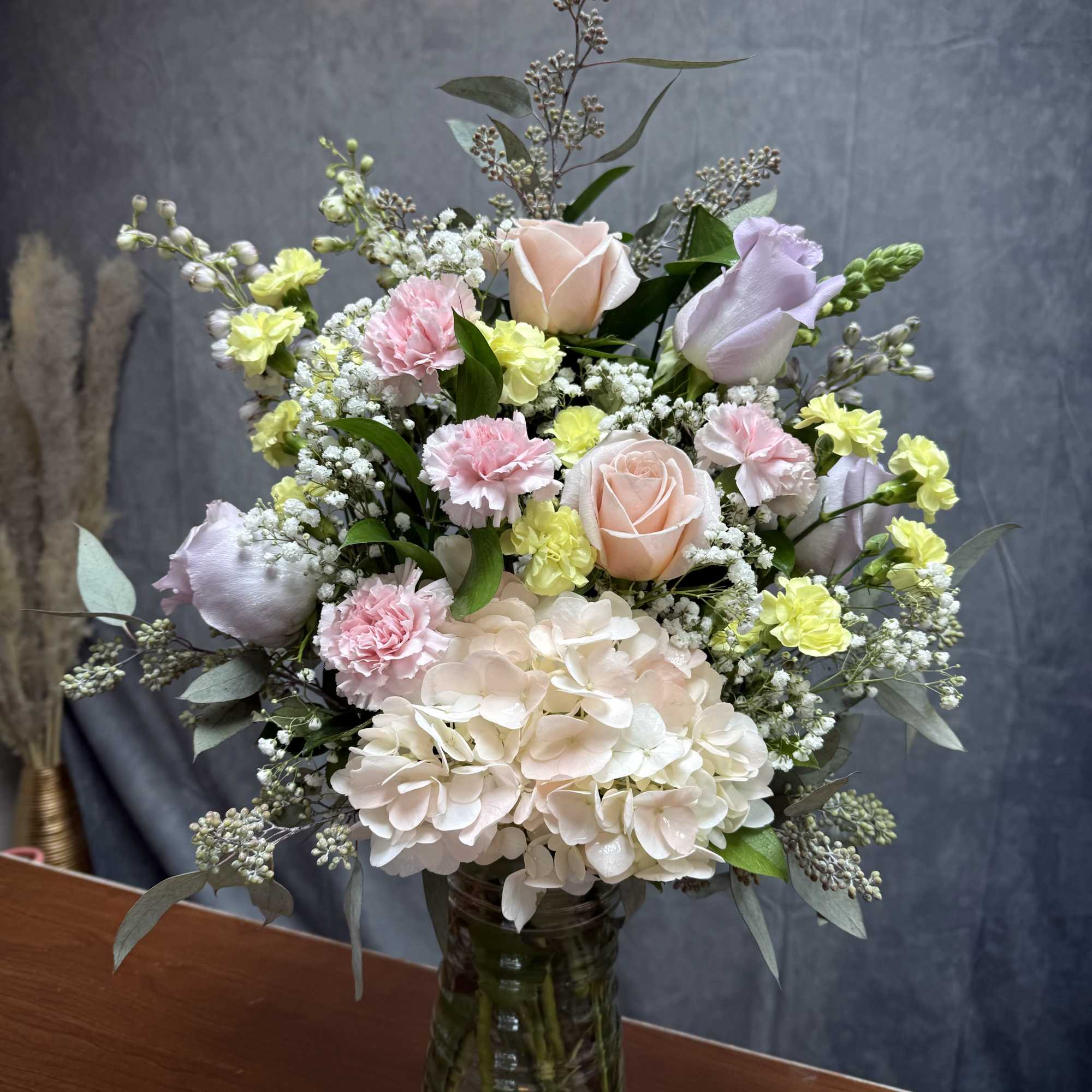 Introducing our new design Pastel Blooms, beautifully arranged with mums, spray roses
