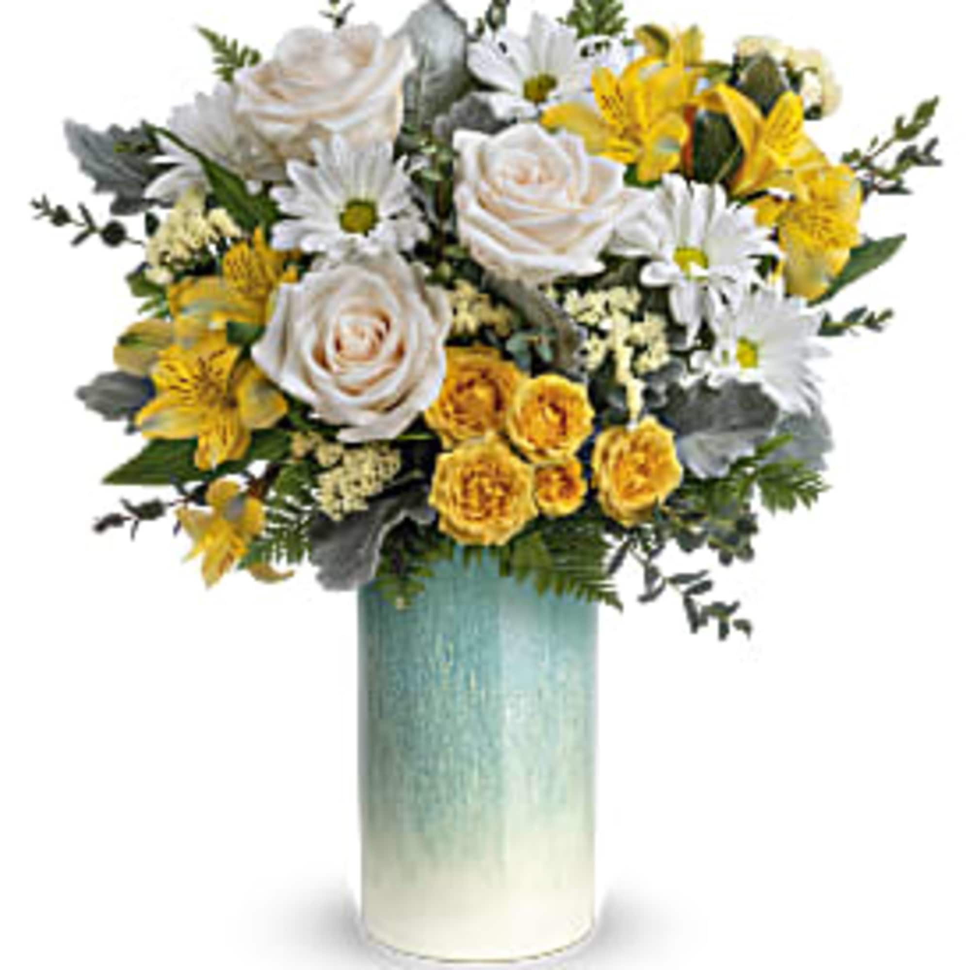 Tall vase of white roses, daisies, and yellow flowers in a blue ombré cylinder