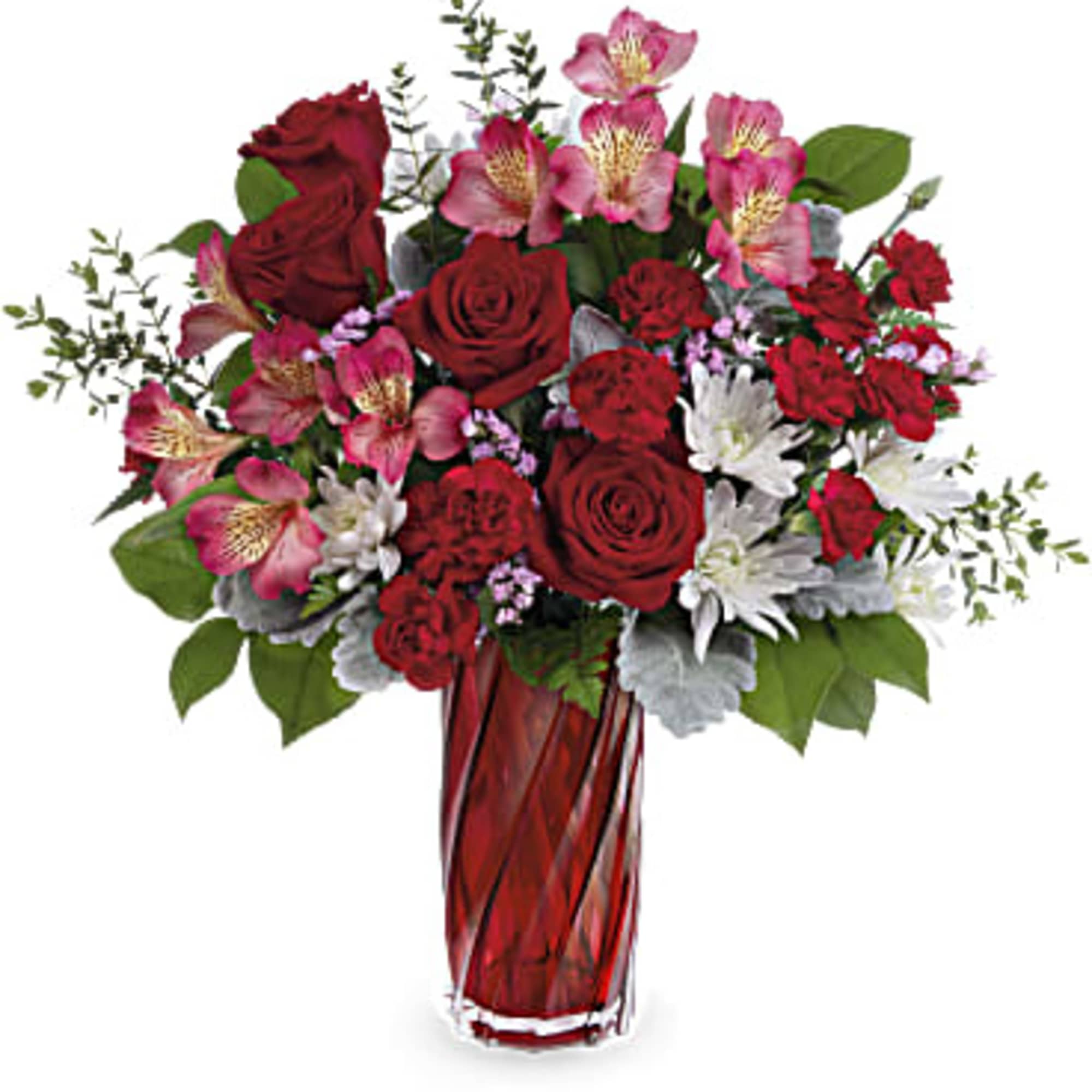 Arrangement of red roses, carnations, pink alstroemeria, and white mums in a tall red glass vase.