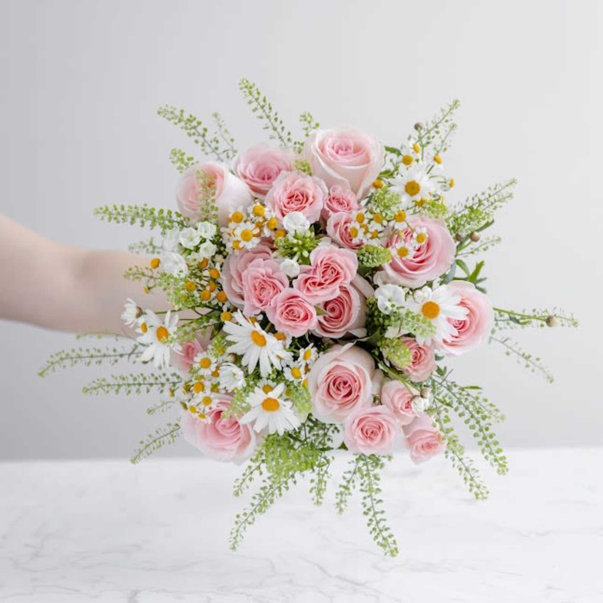 A flirty twist on the standard rose bouquet.

*Vase not included