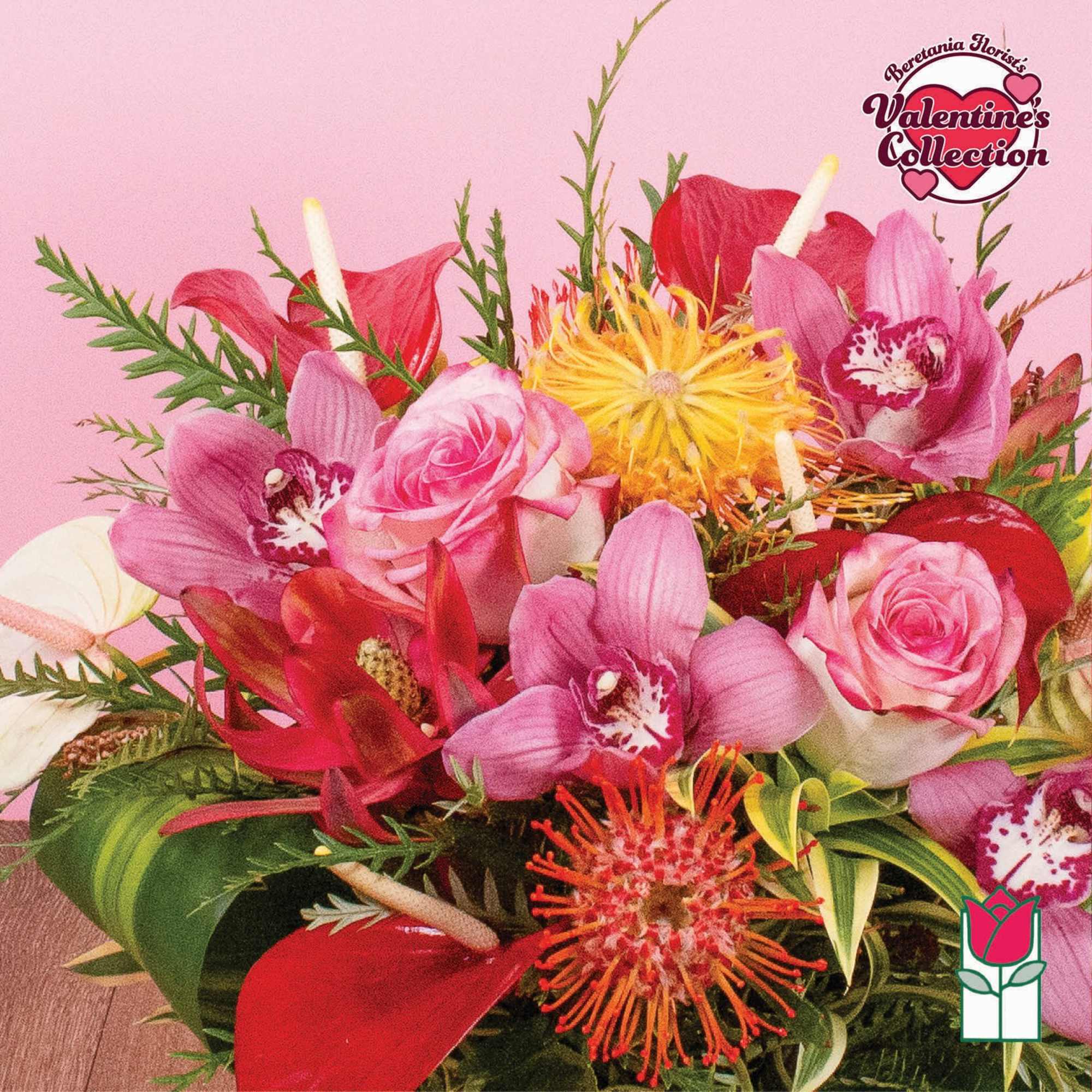 Vibrant bouquet with pink roses, orchids, red tropical blooms, and yellow pincushion flowers.