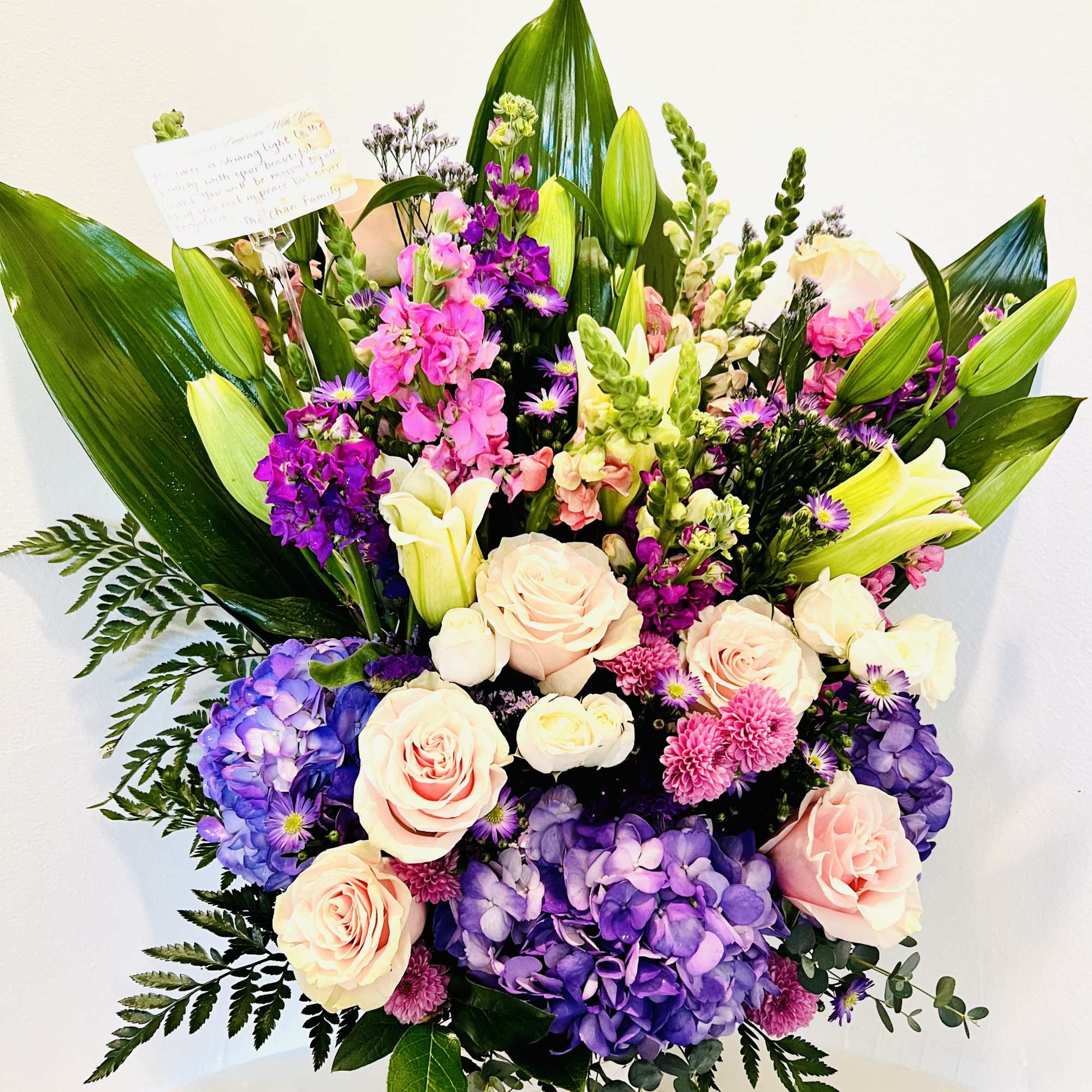 Created with purple,mauve and pink blooms , winnie is the one for