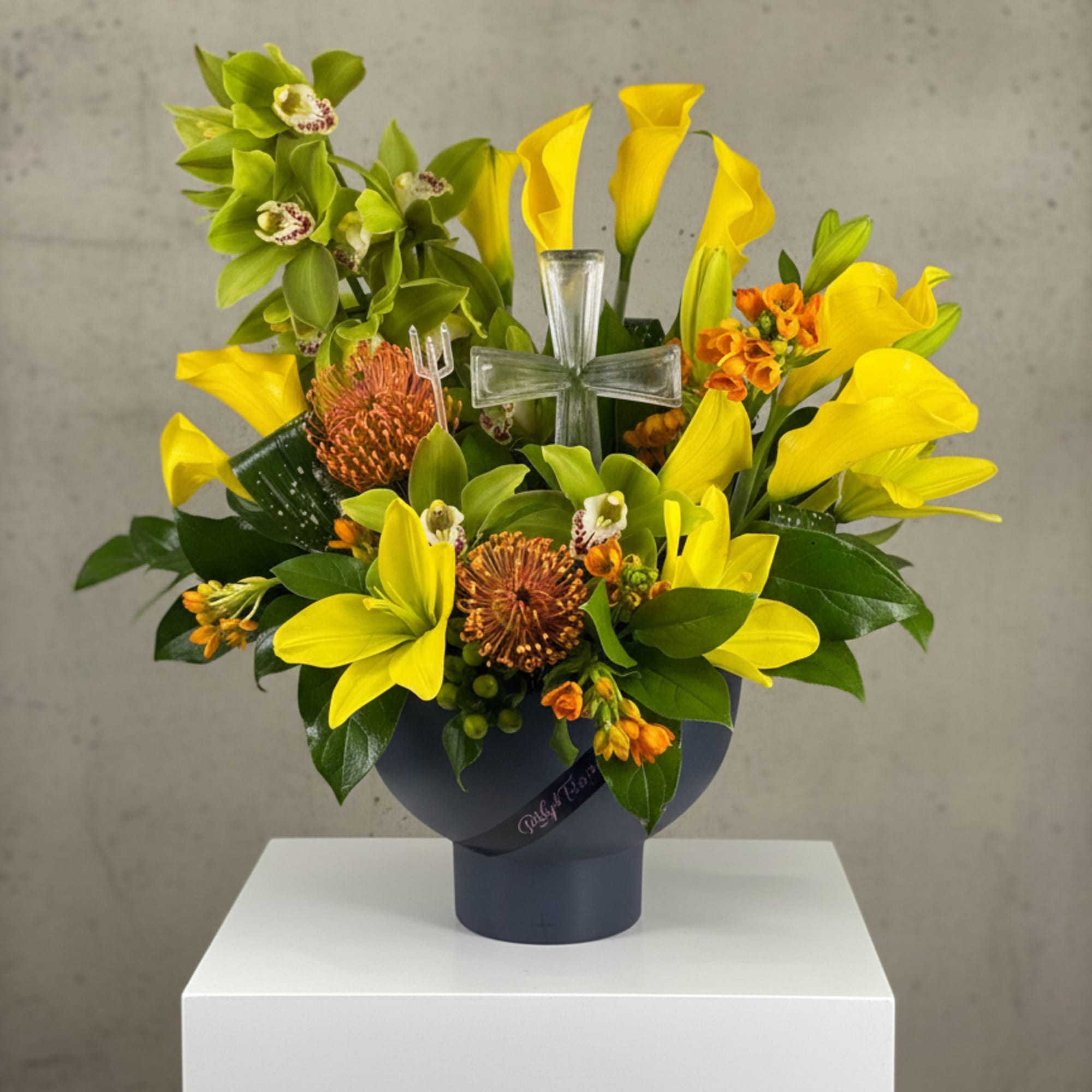 Yellow bouquet with keepsake cross insert. 