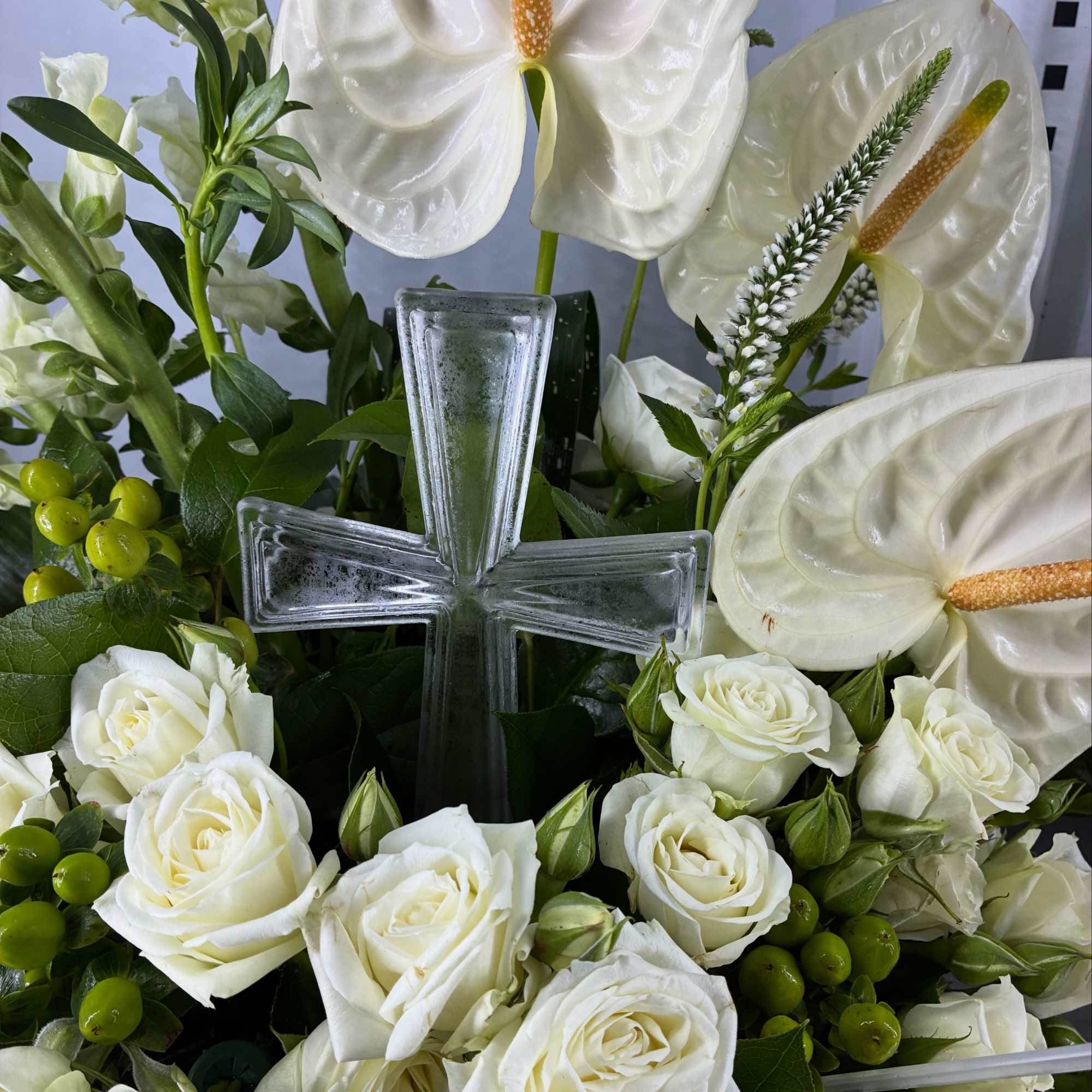 All white florals (color can be substituted upon request). Anthurium color may
