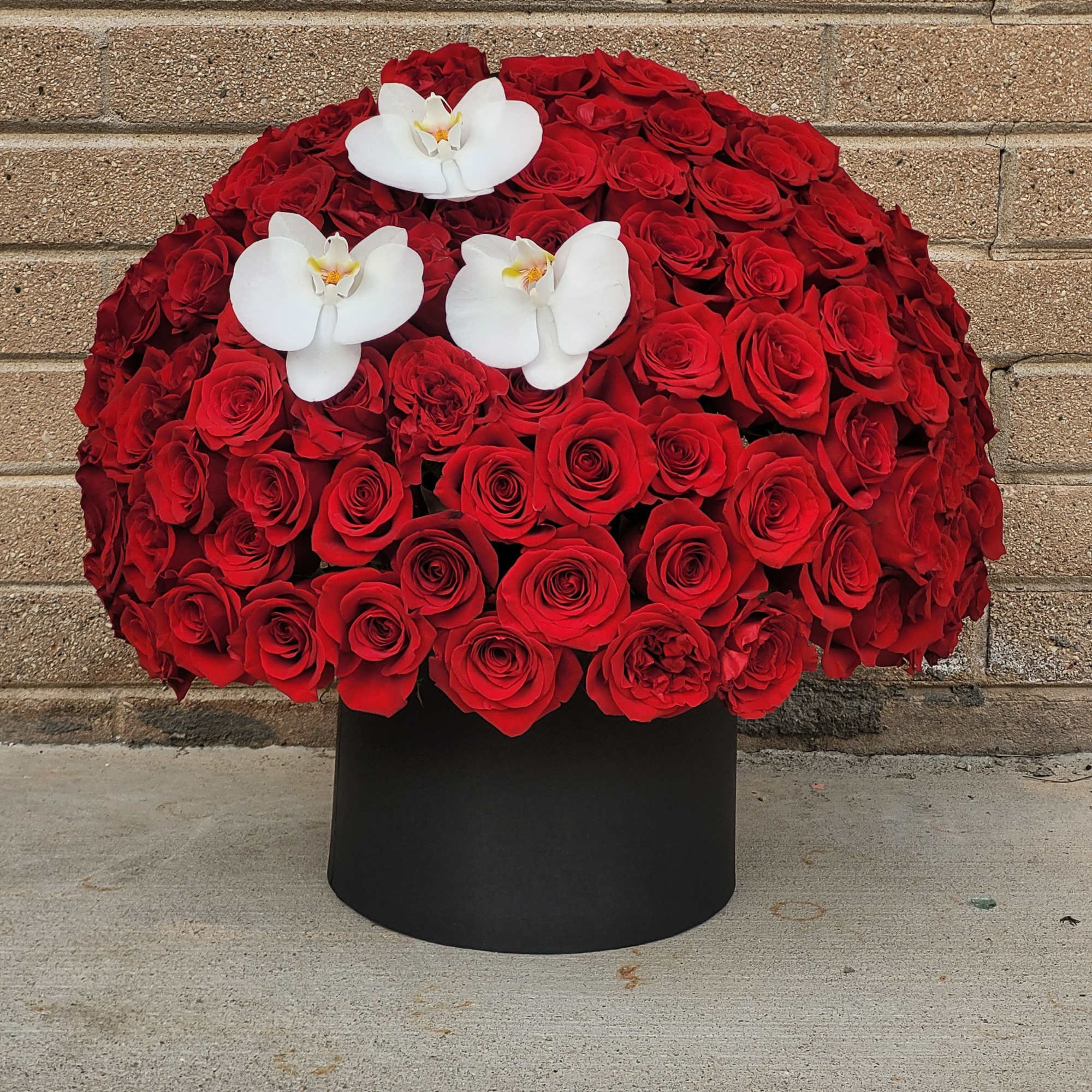 Say &ldquo;I love you&rdquo; with a luxurious box of velvety red roses