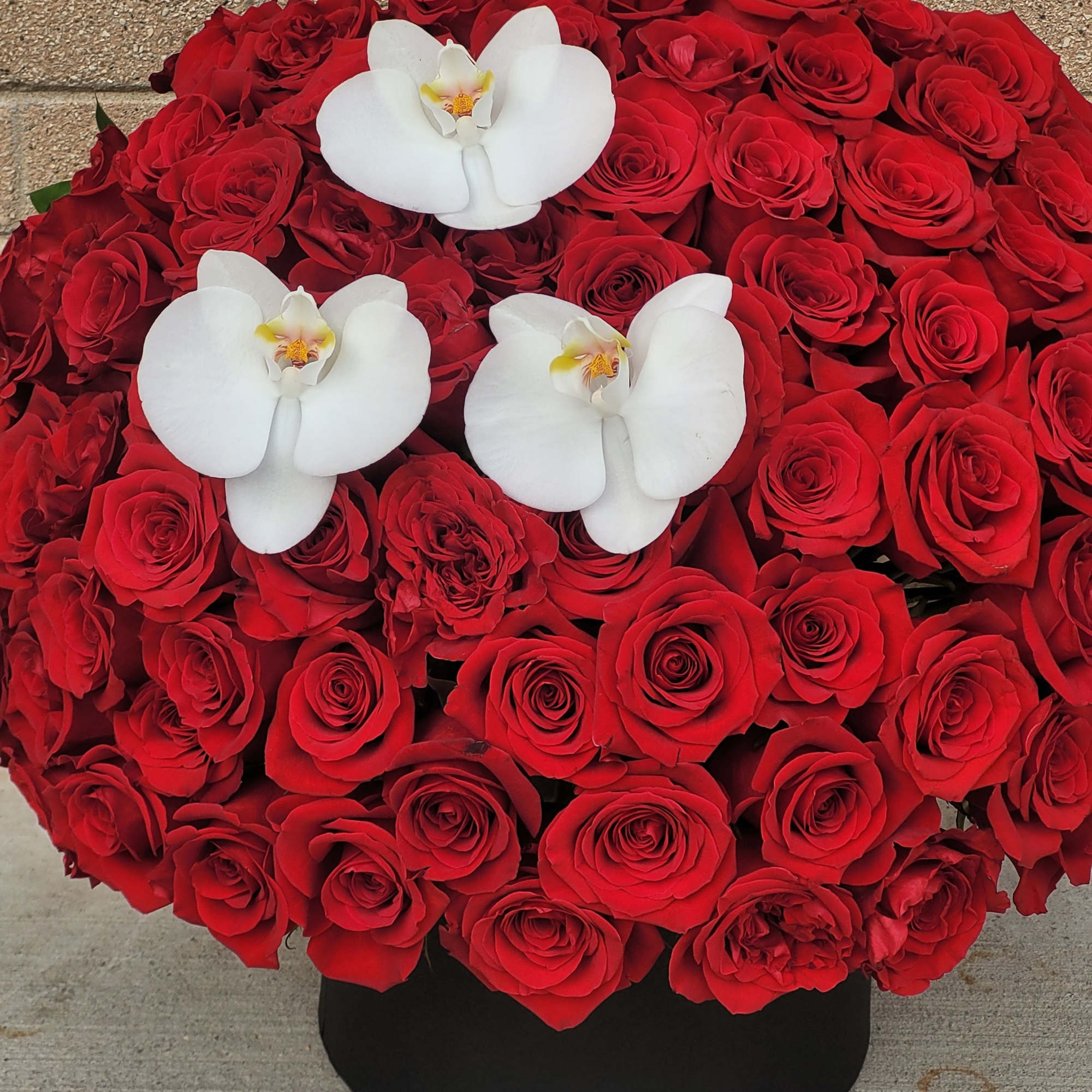 Say &ldquo;I love you&rdquo; with a luxurious box of velvety red roses