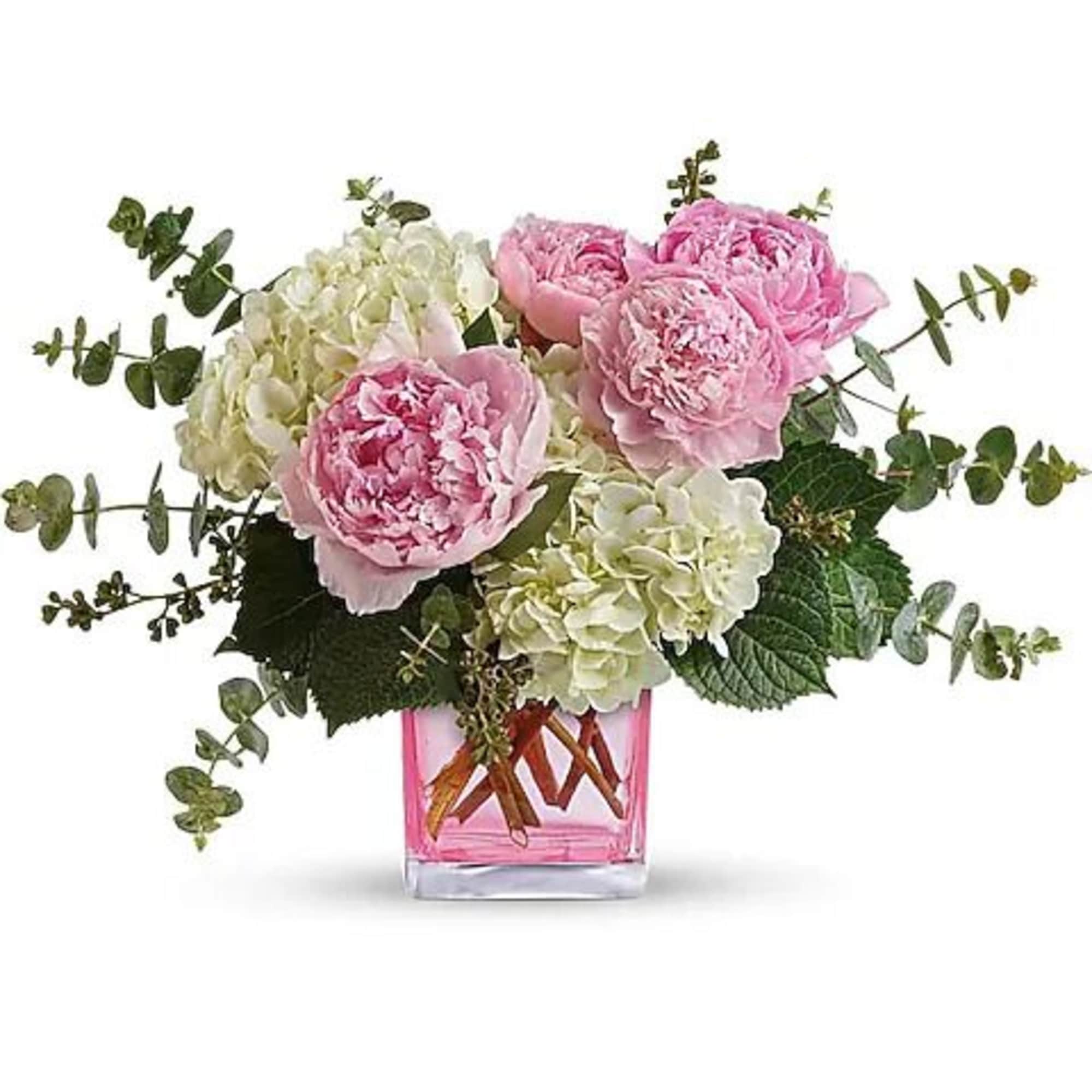 These pretty pink peonies must feel like they've landed in paradise. And