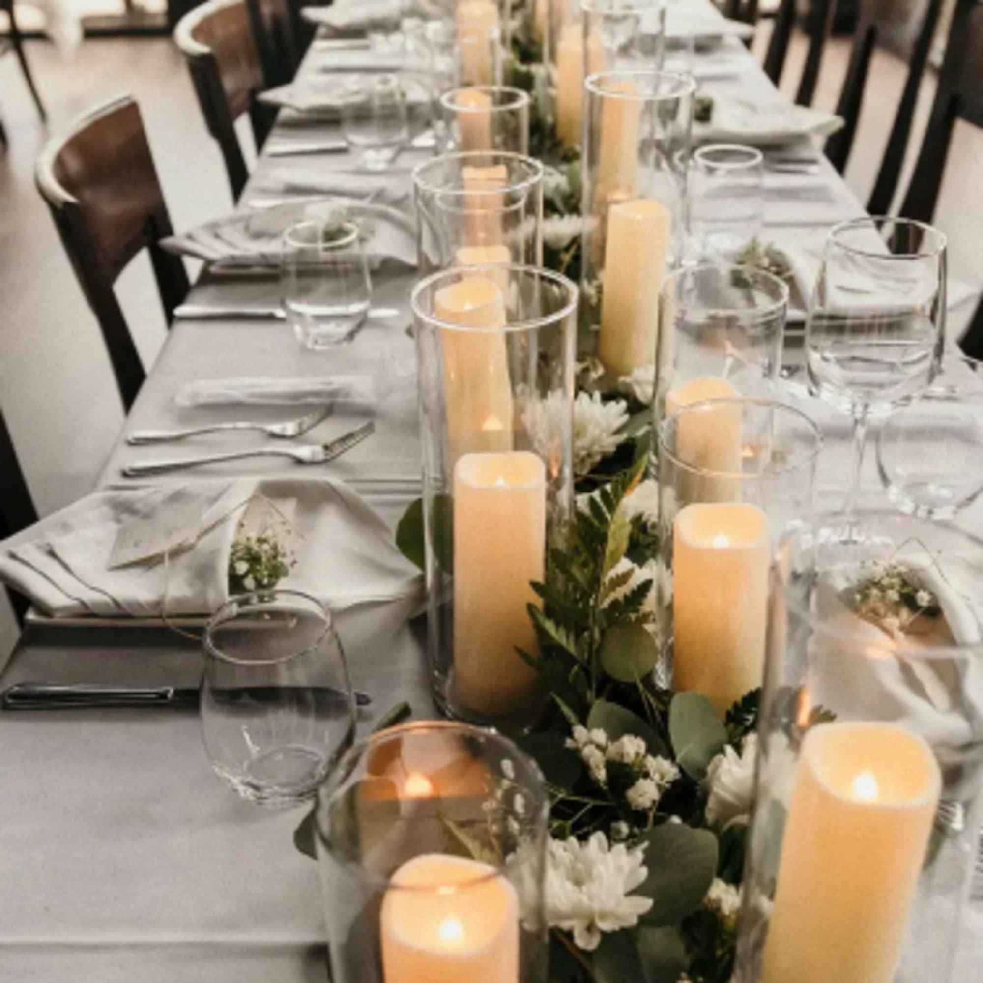 Candlelight Garden Table is an elegant and atmospheric centerpiece designed to transform
