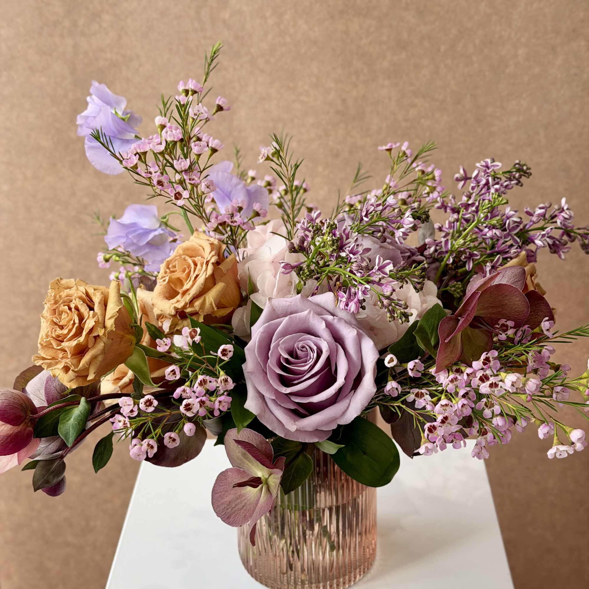 Thoughtfully curated color palette for a lush, springy arrangement in pink, lavender
