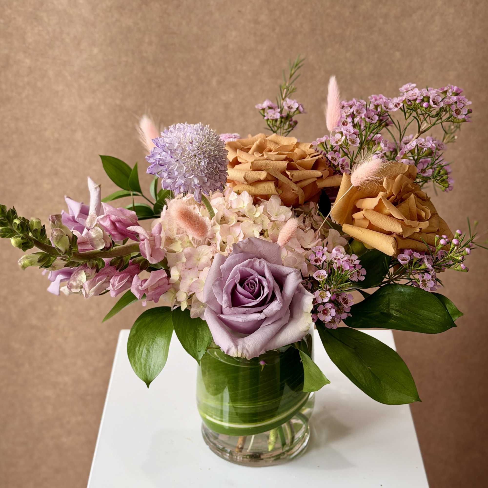 Thoughtfully curated color palette for a lush, springy arrangement in pink, lavender