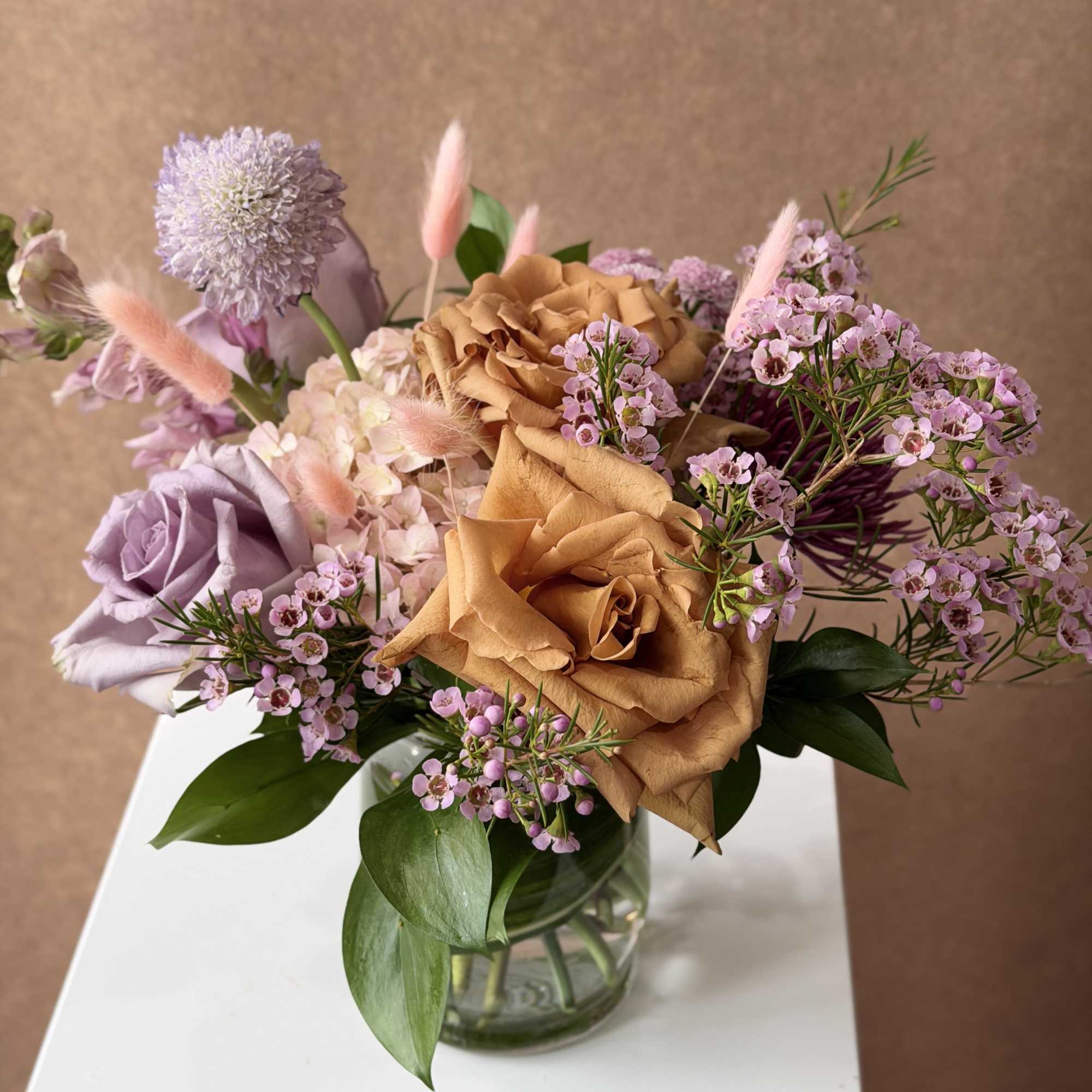 Thoughtfully curated color palette for a lush, springy arrangement in pink, lavender