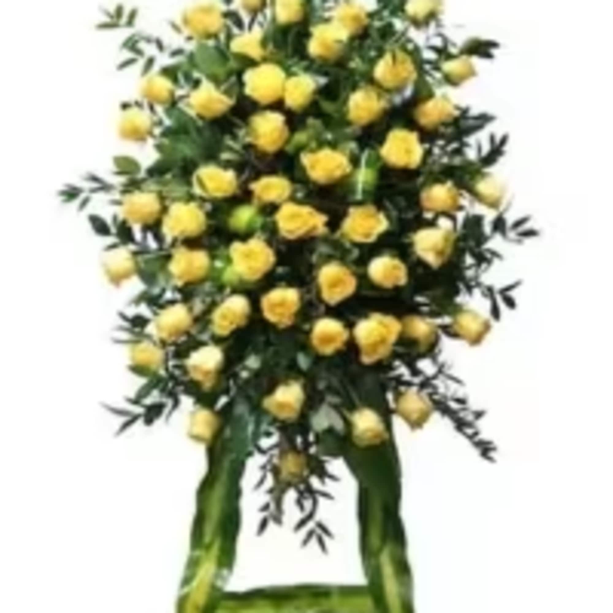 A radiant and elegant all-yellow rose standing spray designed to honor a