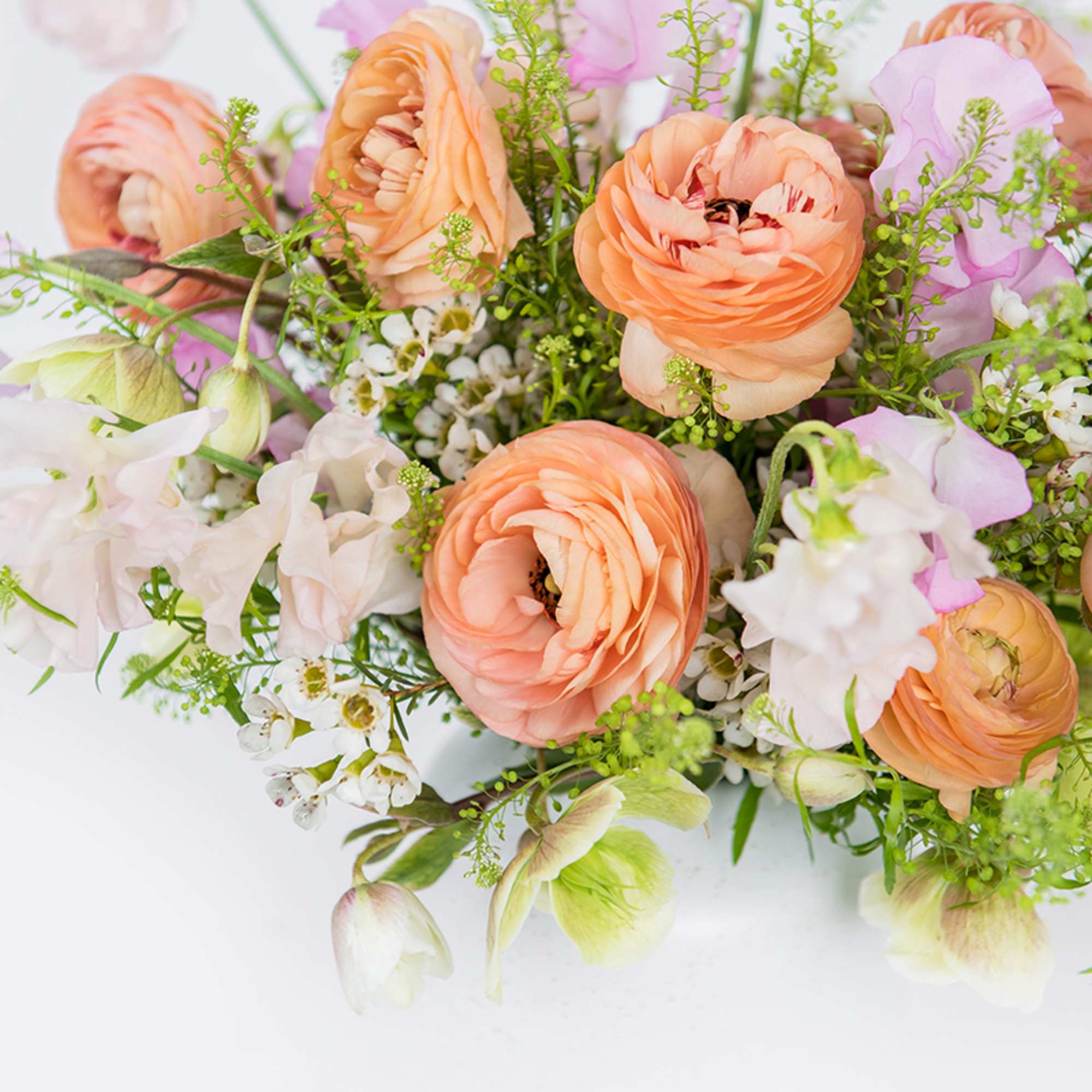Peach and lavender bouquet with white blossoms