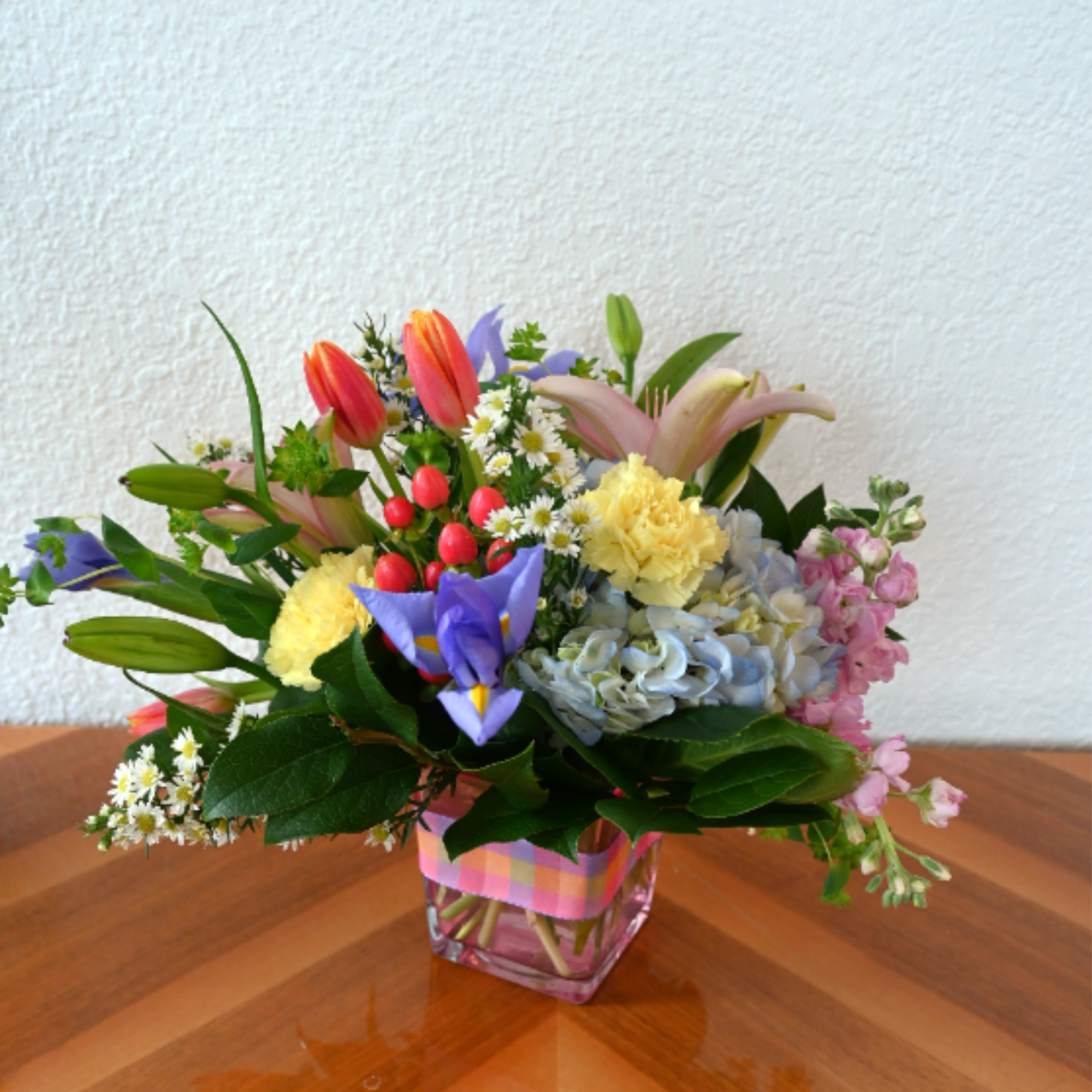 Bring the garden indoors with this delightful array of spring color! The