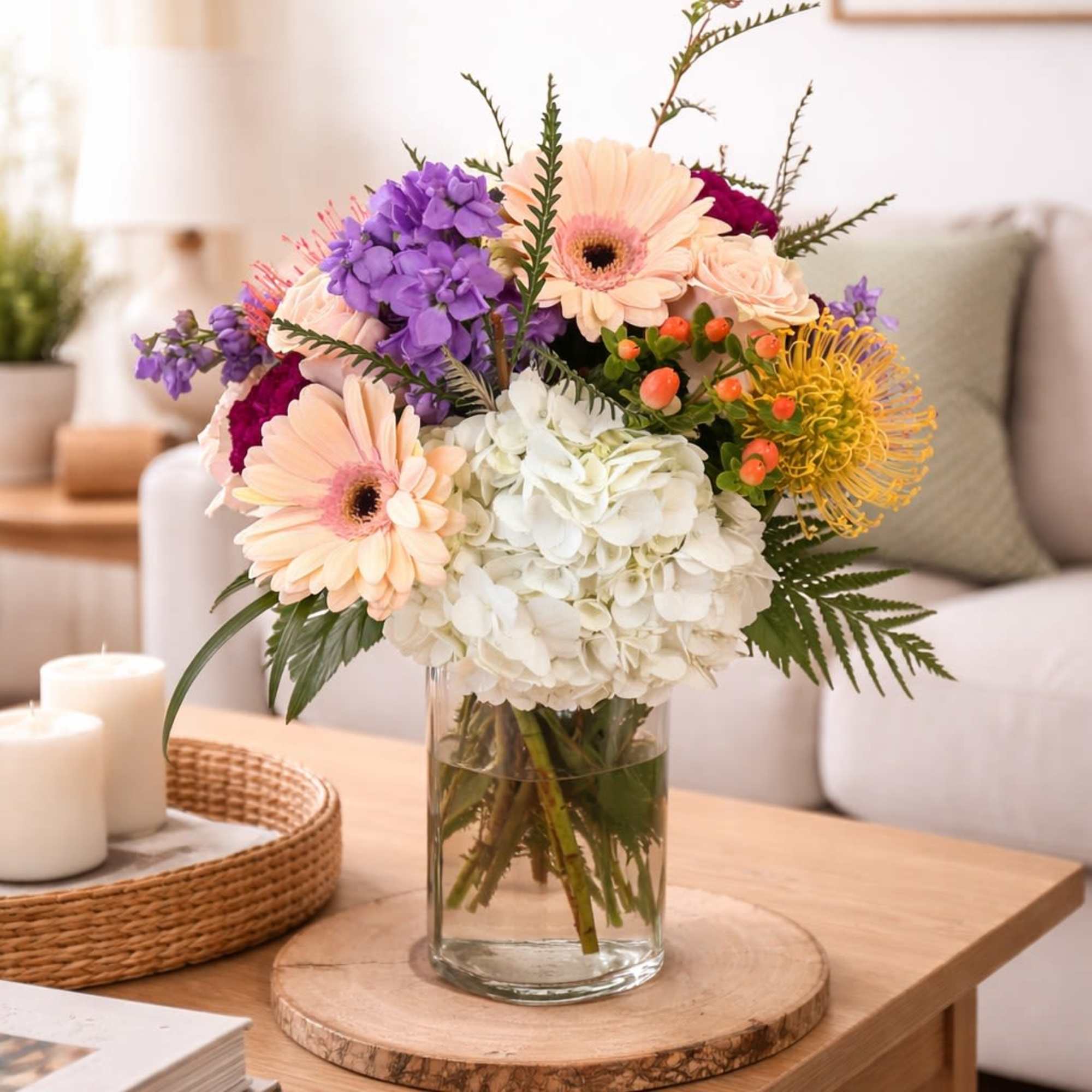 This Gorgeous Arrangement features a wonderful mixture of roses, hydrangea, and other