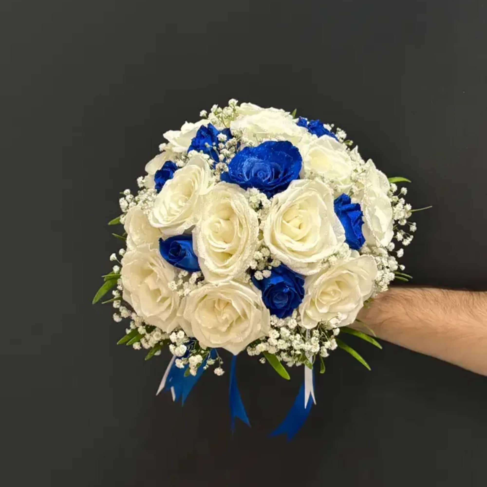Blue Elegance Rose Bridal is a timeless wedding bouquet that pairs the
